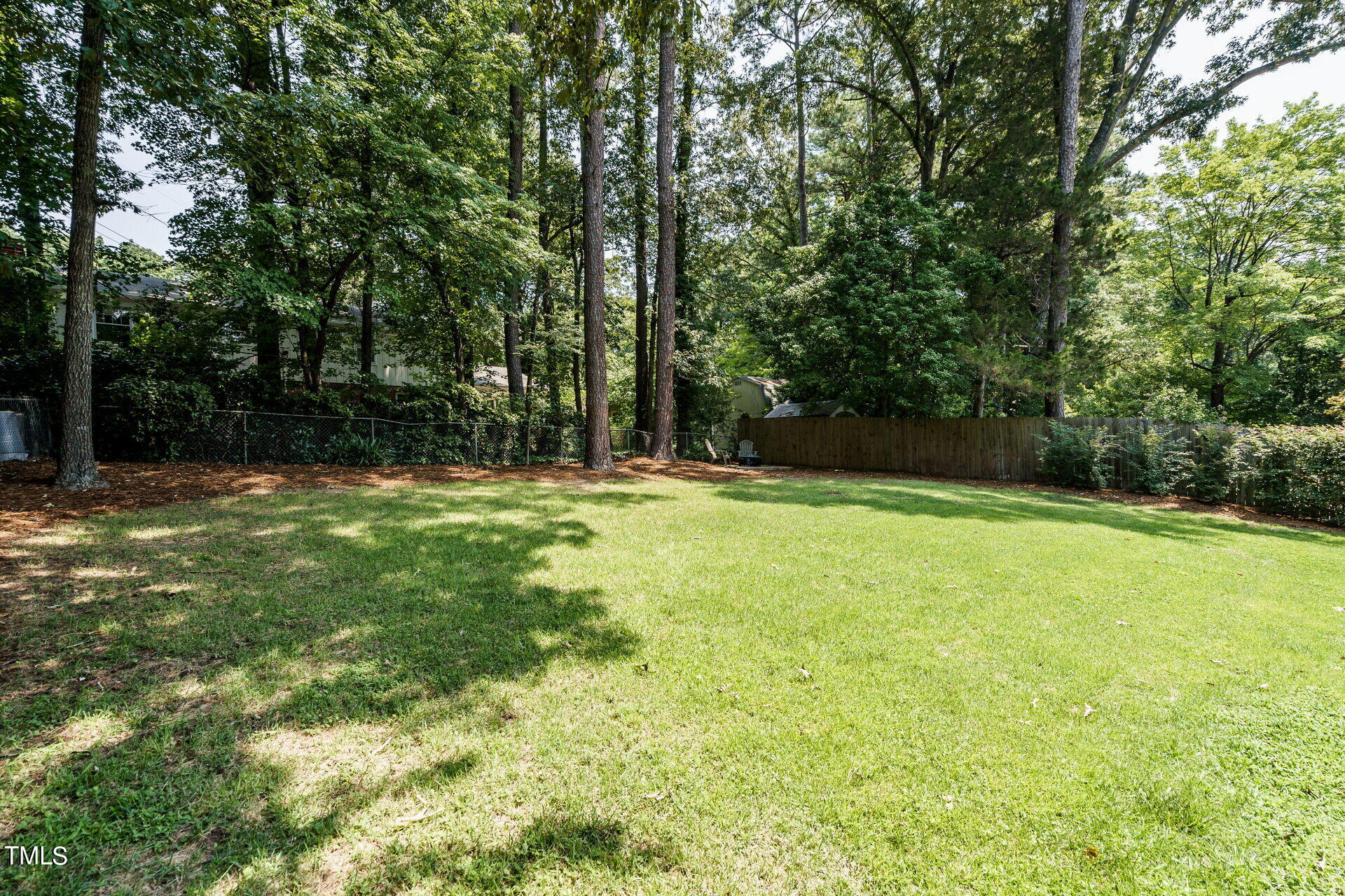 318 Glen Valley Road Raleigh, NC 27609 - Photo 35 of 39 a view of outdoor space with deck and yard