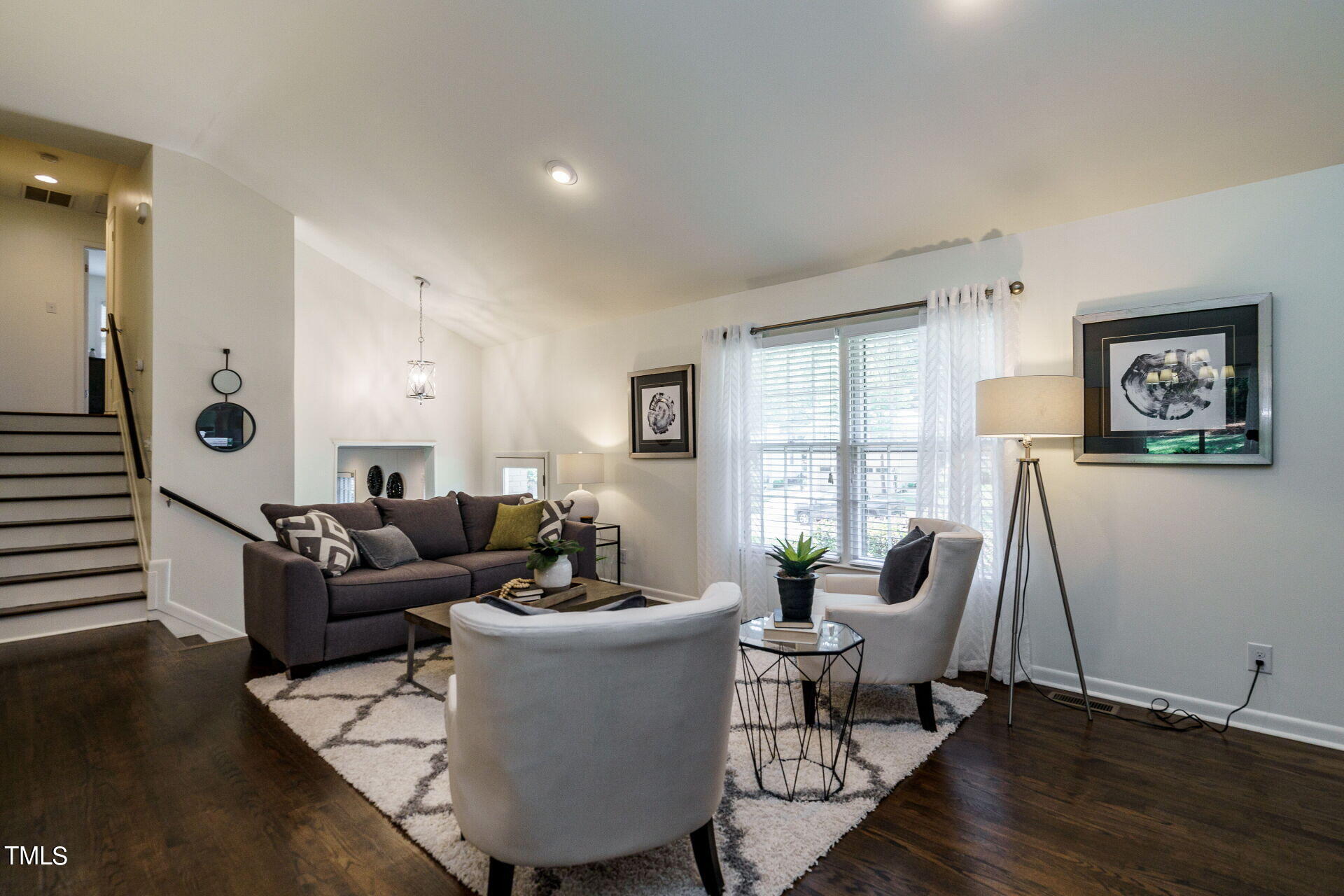 318 Glen Valley Road Raleigh, NC 27609 - Photo 4 of 39 a living room with furniture and a large window
