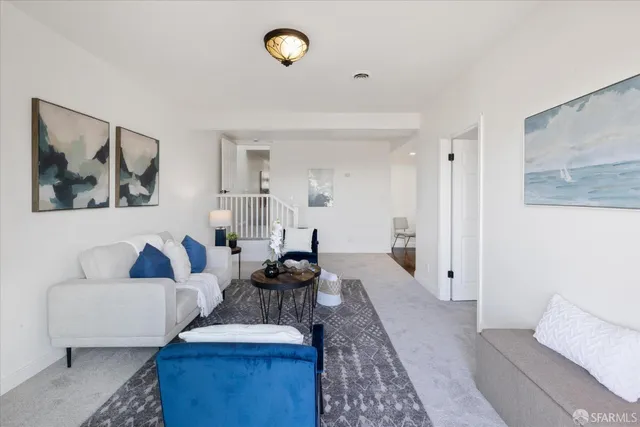 an aerial view of a house with a swimming pool outdoor seating and yard