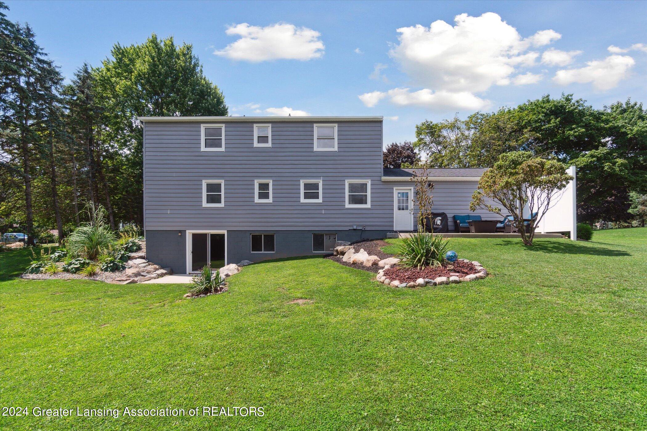 13121 Tucker Road Dewitt, MI 48820 - Photo 39 of 56 Rear View
