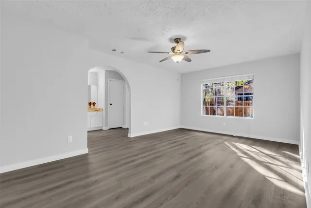 a bathroom with a double vanity sink mirror and toilet
