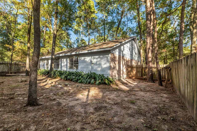 a backyard of a house with lots of green space