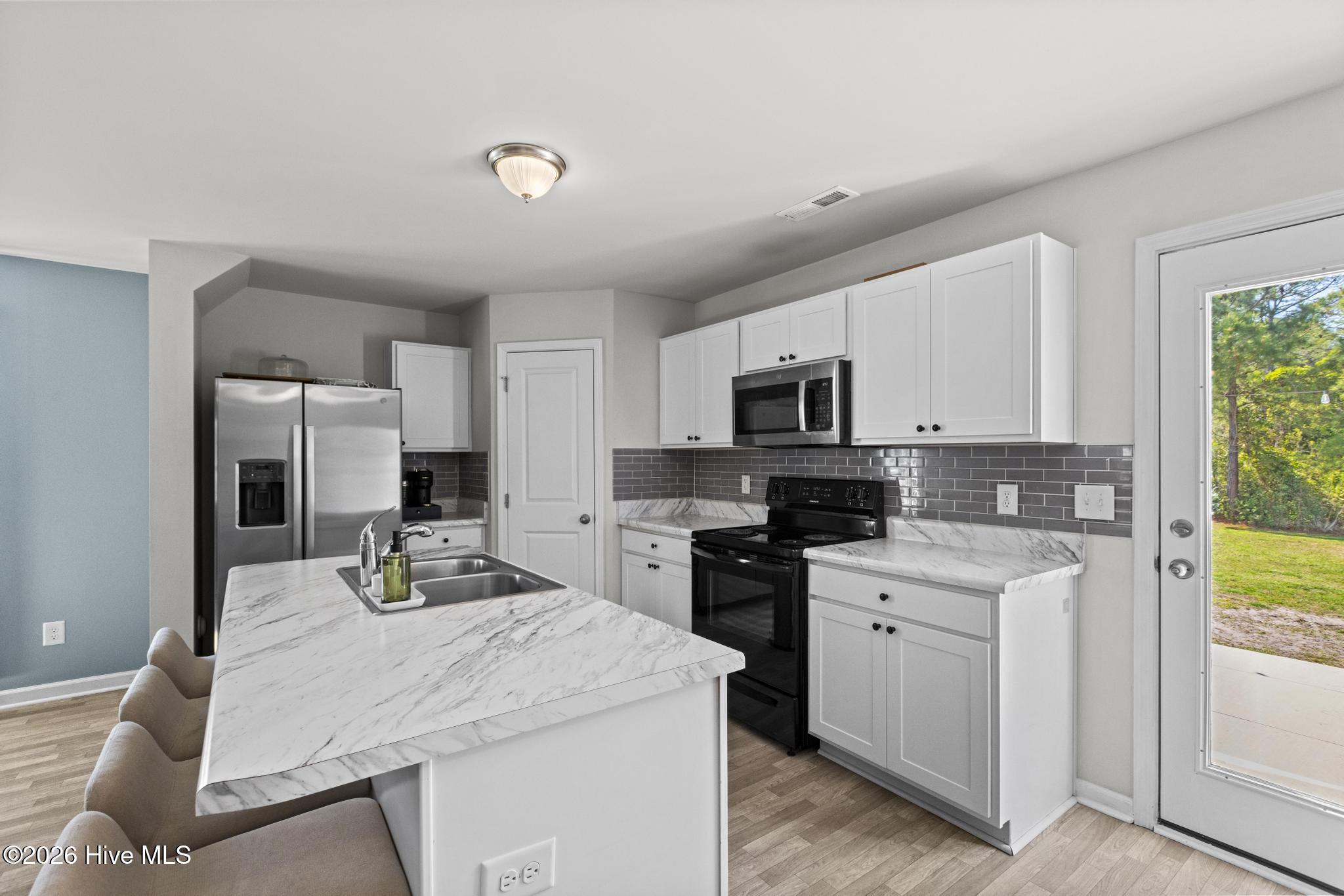 202 New Home Place, Unit LOT #2 Holly Ridge, NC 28445 - Photo 7 of 35 425A1037