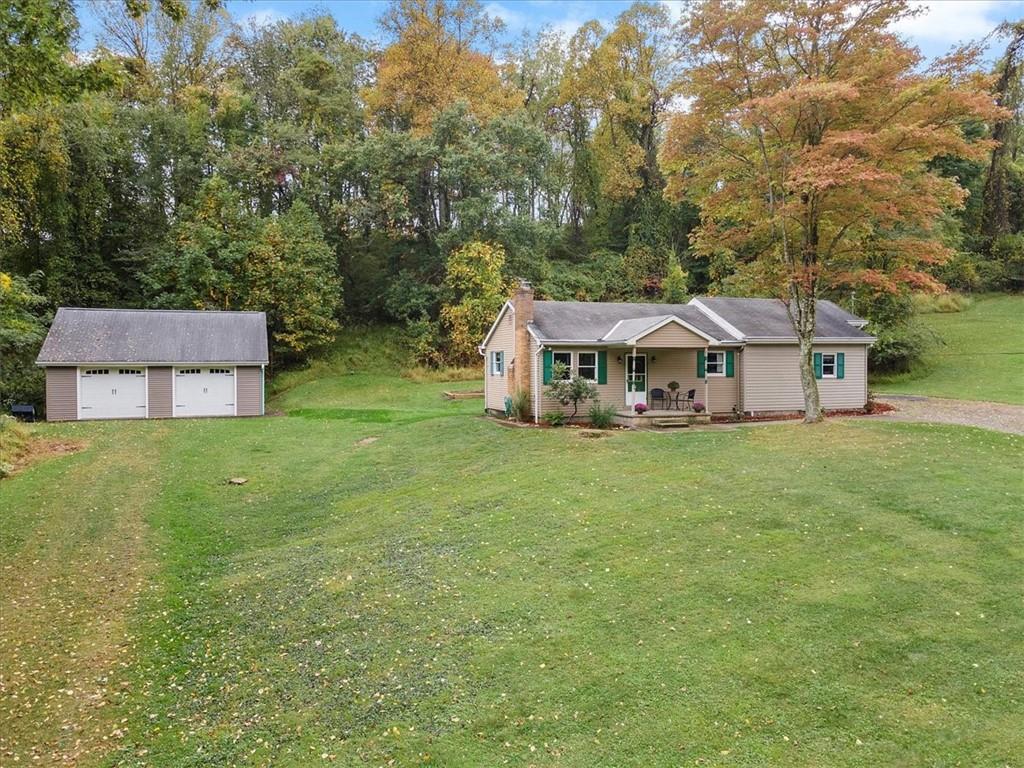 207 Amsler Road Sewickley, PA 15143 - Photo 28 of 33 a front view of a house with garden