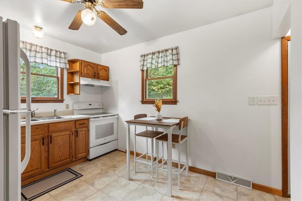 207 Amsler Road Sewickley, PA 15143 - Photo 10 of 33 a view of a kitchen with a sink and a window