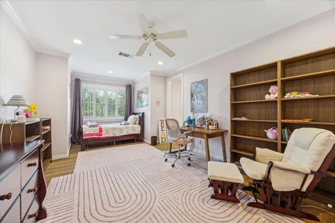 a bathroom with a double vanity sink a mirror a and a shower