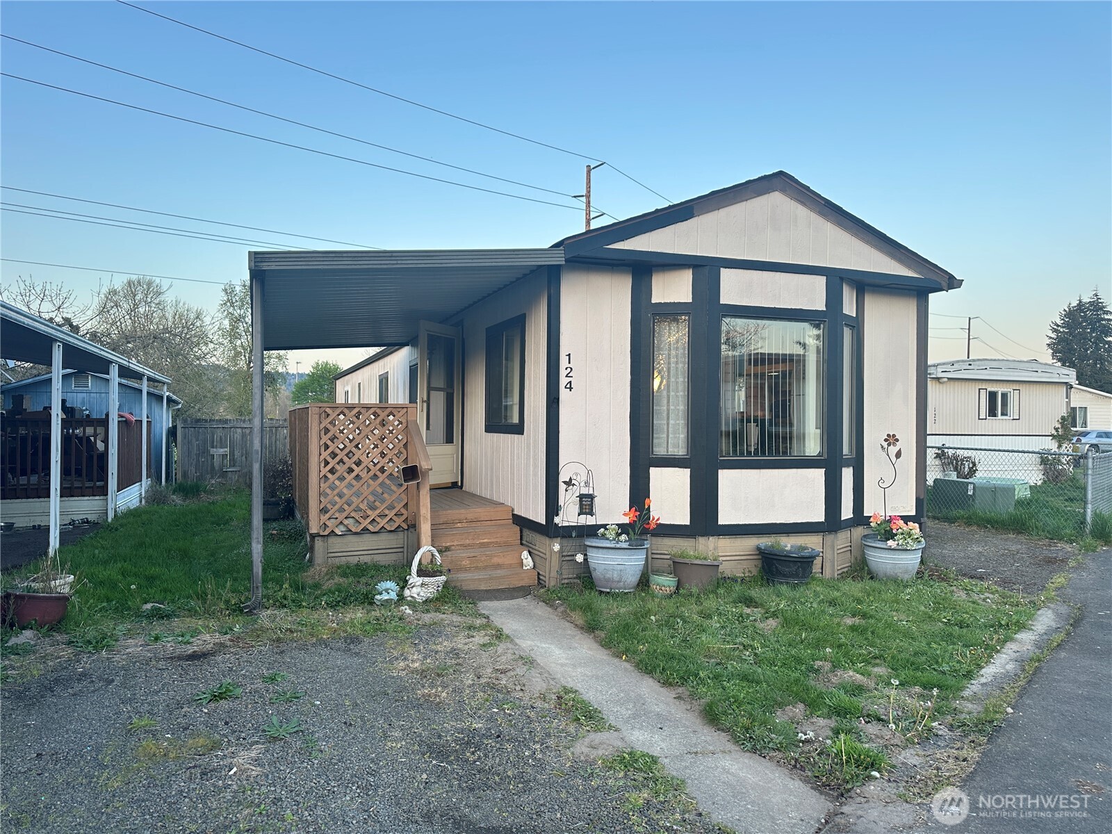 5600 Mt Solo Road, Unit 124 Longview, WA 98632 - Photo 1 of 21 a front view of a house with garden