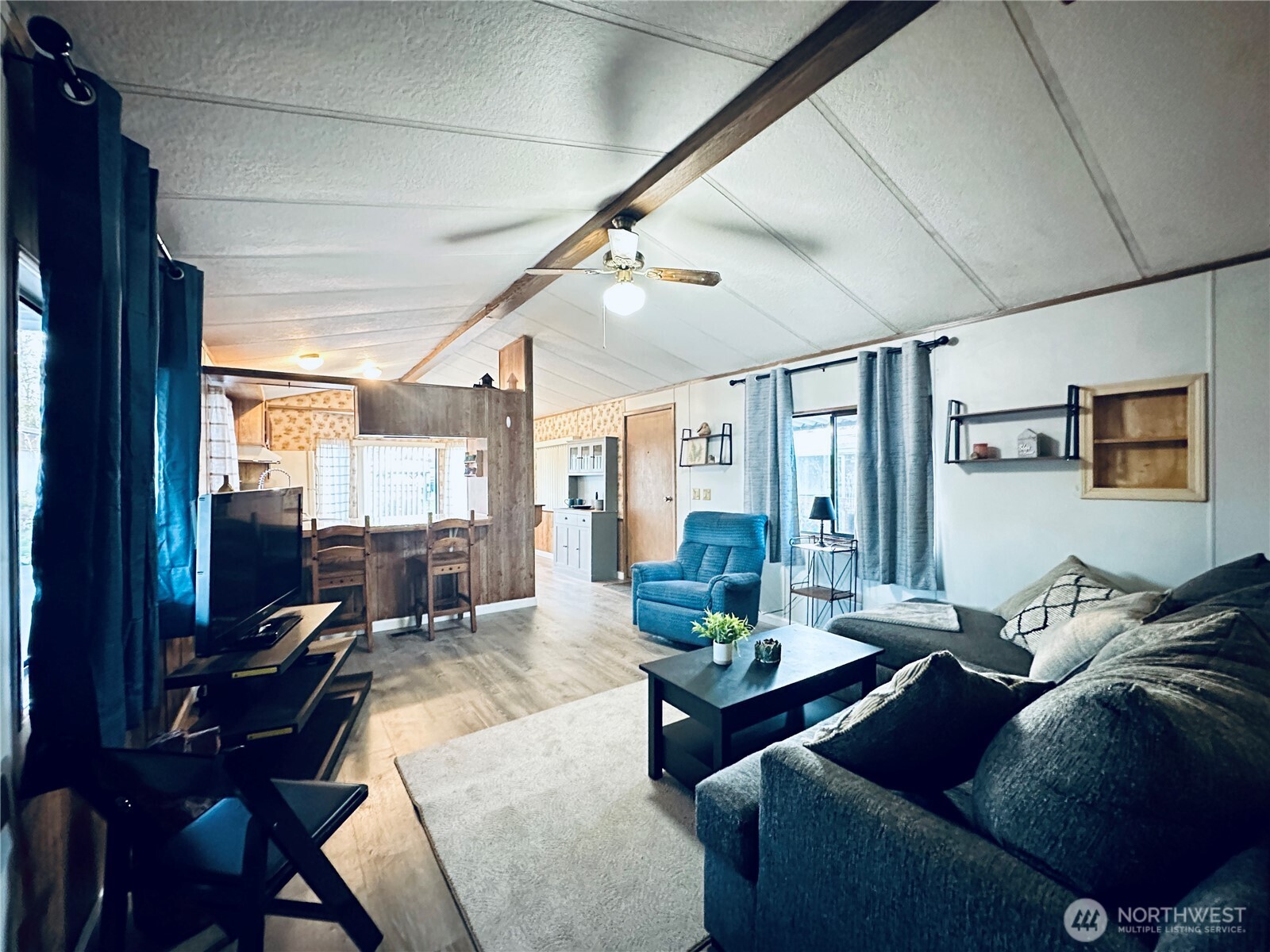 5600 Mt Solo Road, Unit 124 Longview, WA 98632 - Photo 13 of 21 a living room with furniture and a large window