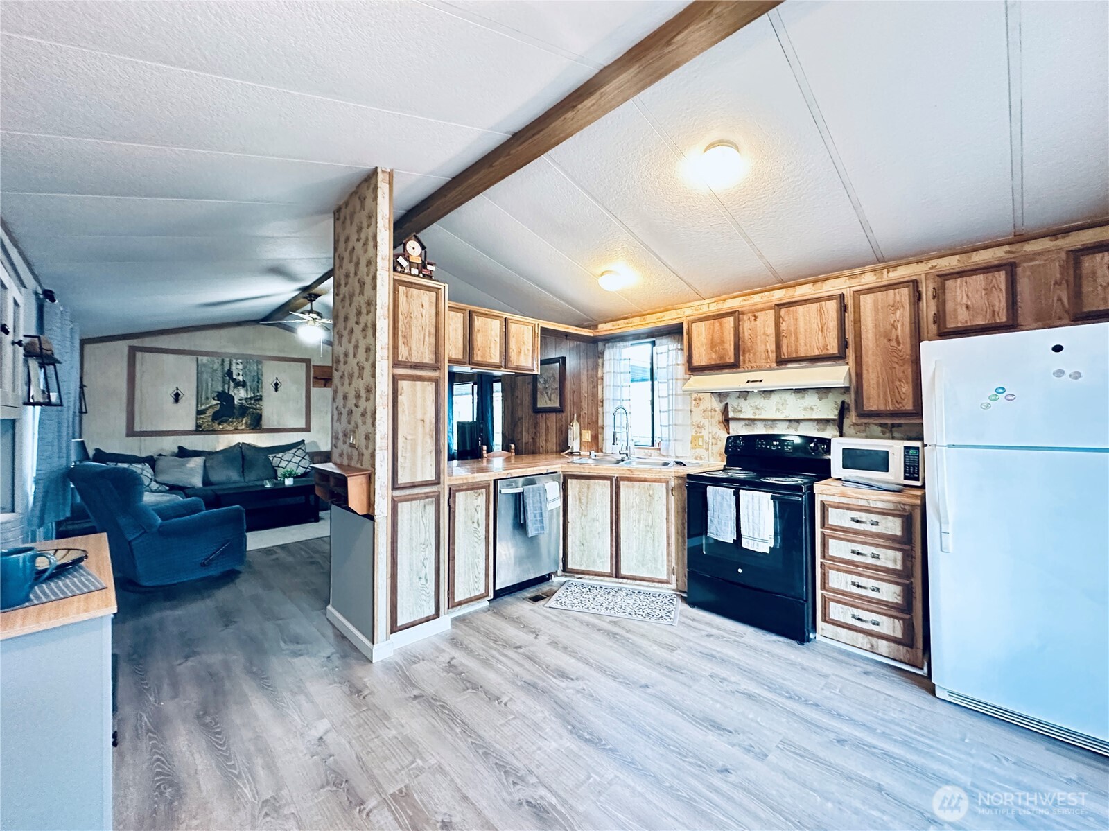 5600 Mt Solo Road, Unit 124 Longview, WA 98632 - Photo 14 of 21 a kitchen with refrigerator and cabinets