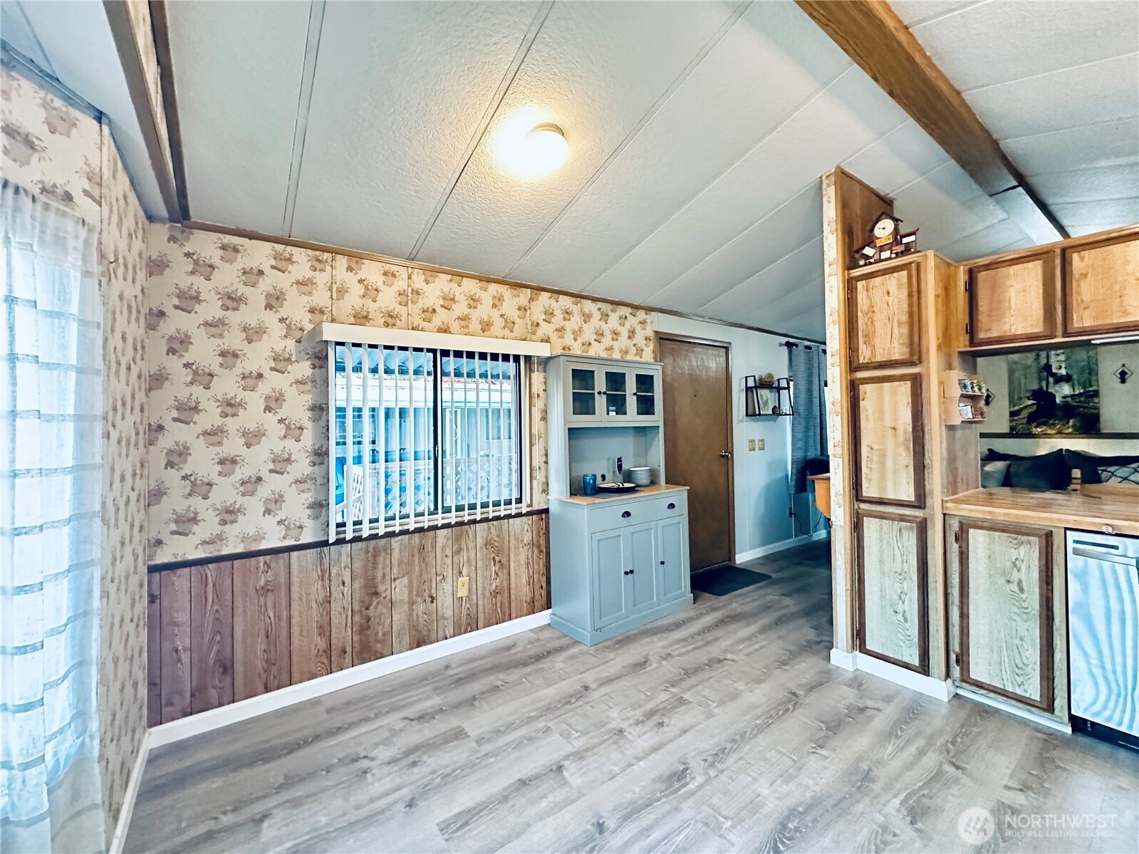 5600 Mt Solo Road, Unit 124 Longview, WA 98632 - Photo 15 of 21 a view of a kitchen with a sink and refrigerator