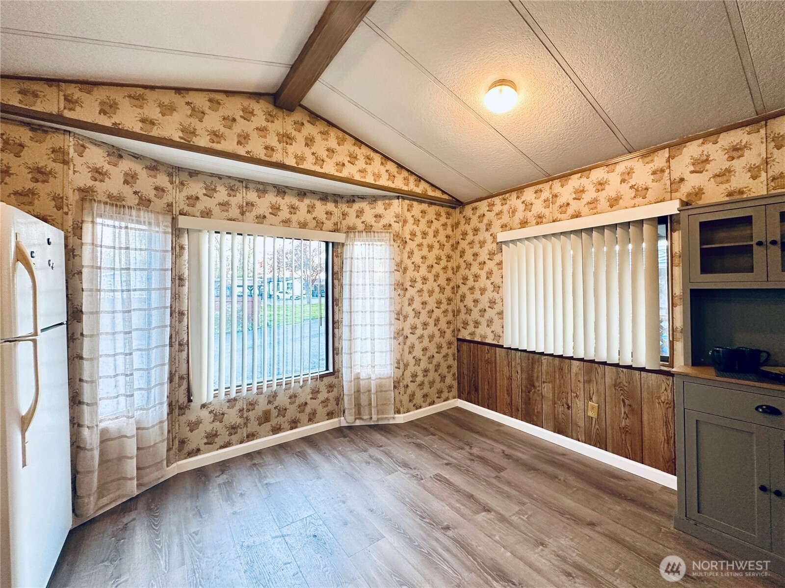 5600 Mt Solo Road, Unit 124 Longview, WA 98632 - Photo 16 of 21 a view of an empty room with wooden floor and a window