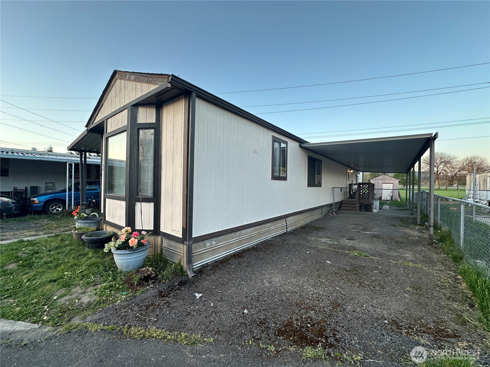 5600 Mt Solo Road, Unit 124 Longview, WA 98632 - Photo 19 of 21 a view of a backyard with large trees and plants