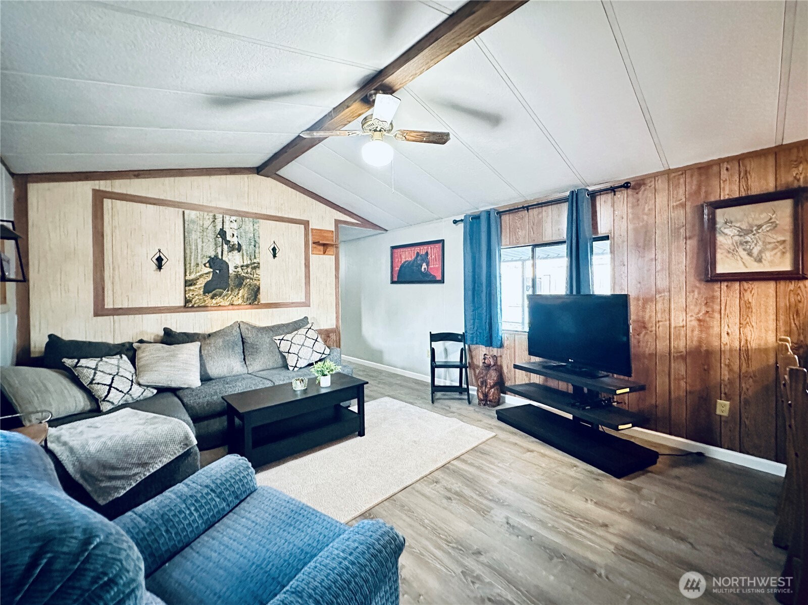 5600 Mt Solo Road, Unit 124 Longview, WA 98632 - Photo 2 of 21 a living room with furniture and a flat screen tv