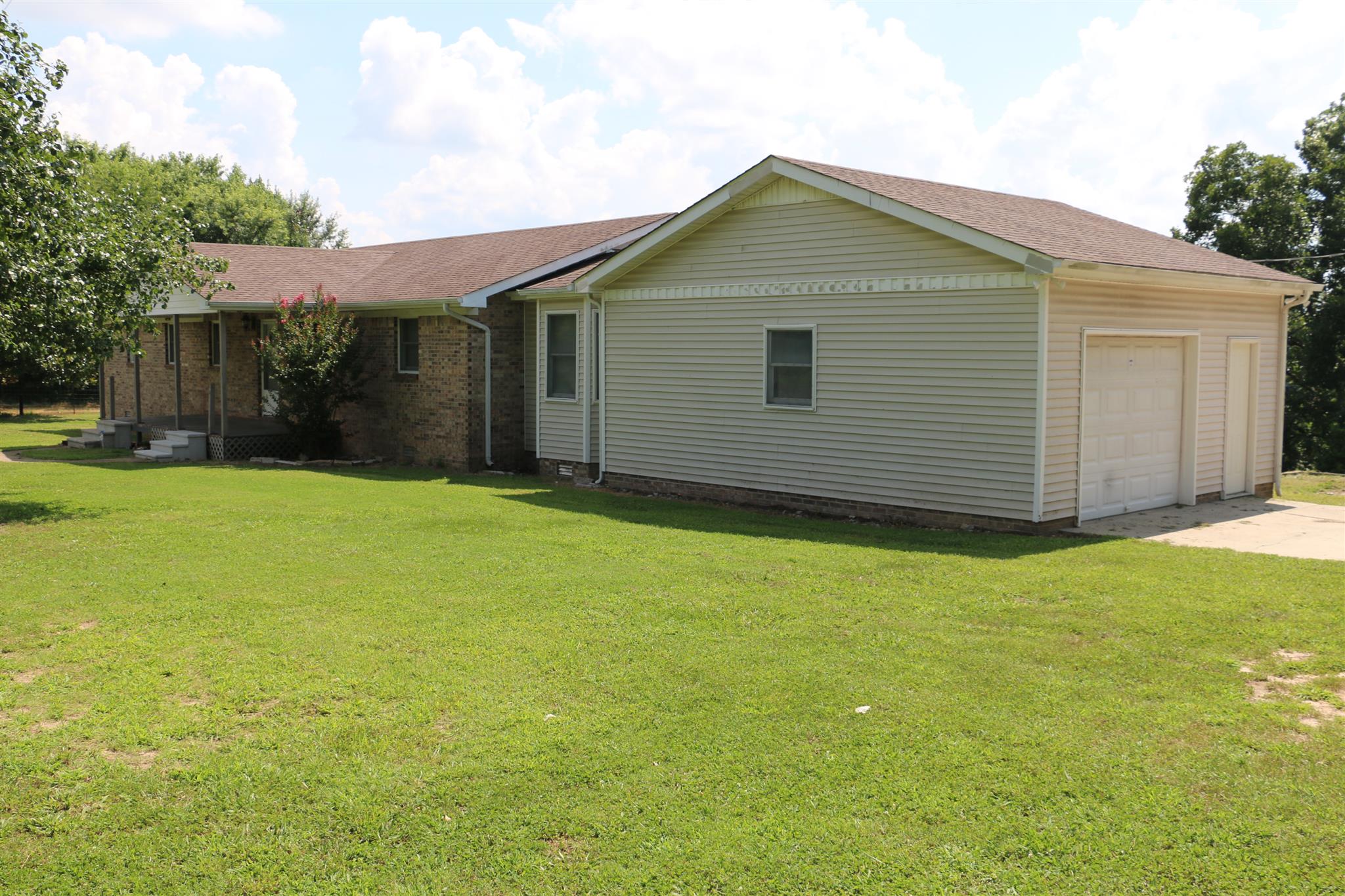 30377 Old Scrouge Road Ardmore, AL 35739 - Photo 2 of 23 Angled Front View of Home - Showing the attached garage.