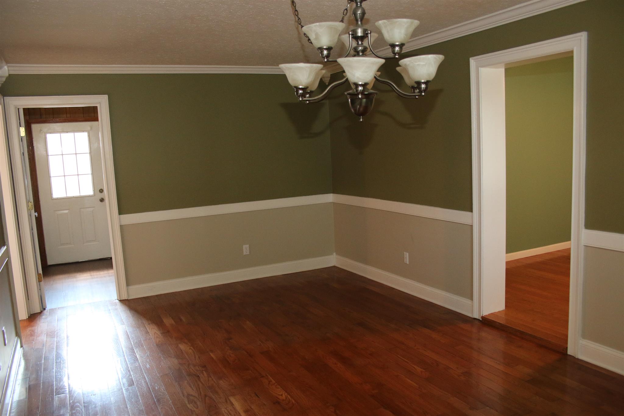 30377 Old Scrouge Road Ardmore, AL 35739 - Photo 6 of 23 Dining Room - With crown molding, hardwood flooring and chair rail.