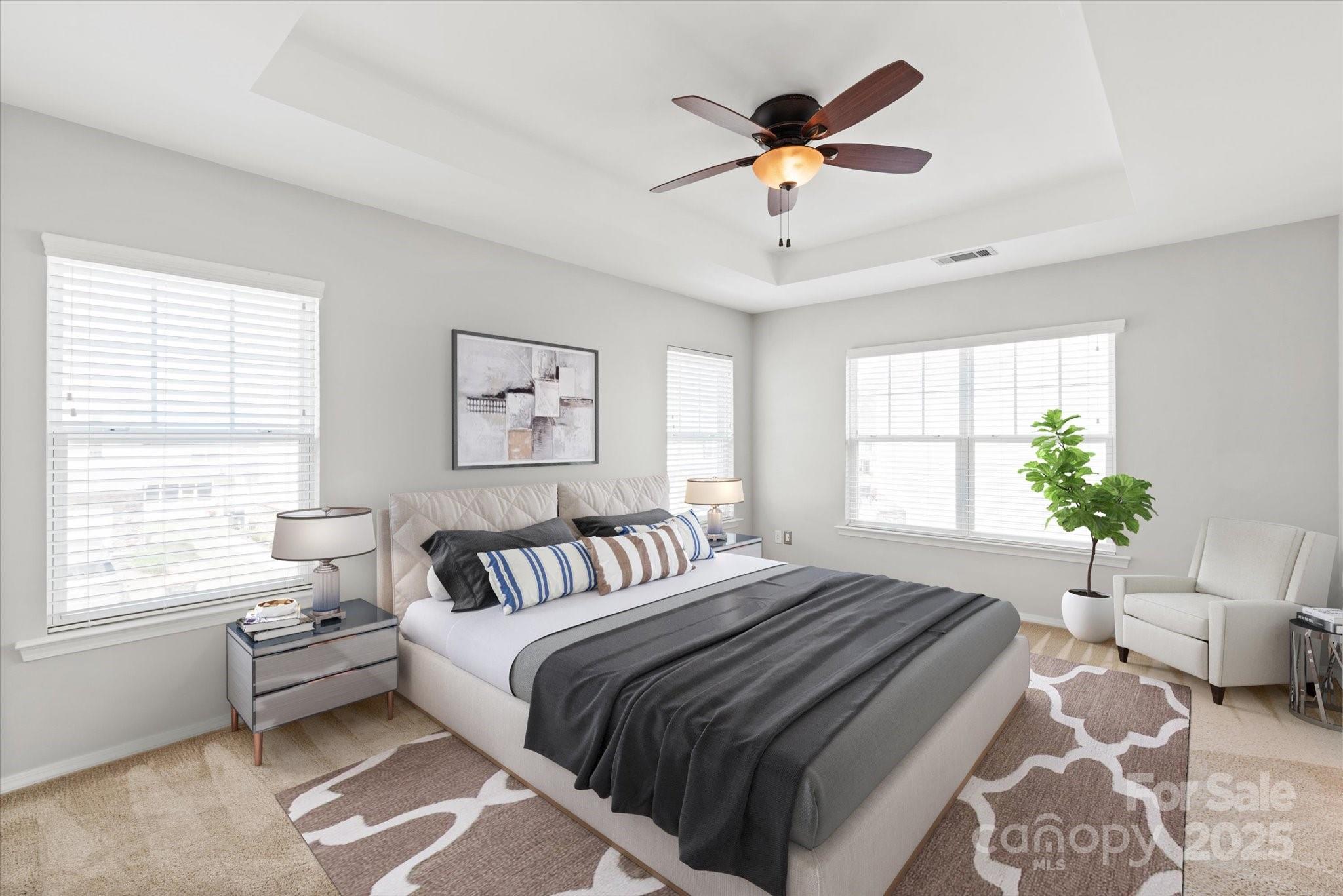 158 Council House Road Fort Mill, SC 29708 - Photo 17 of 41 a spacious bedroom with a bed a window and a potted plant
