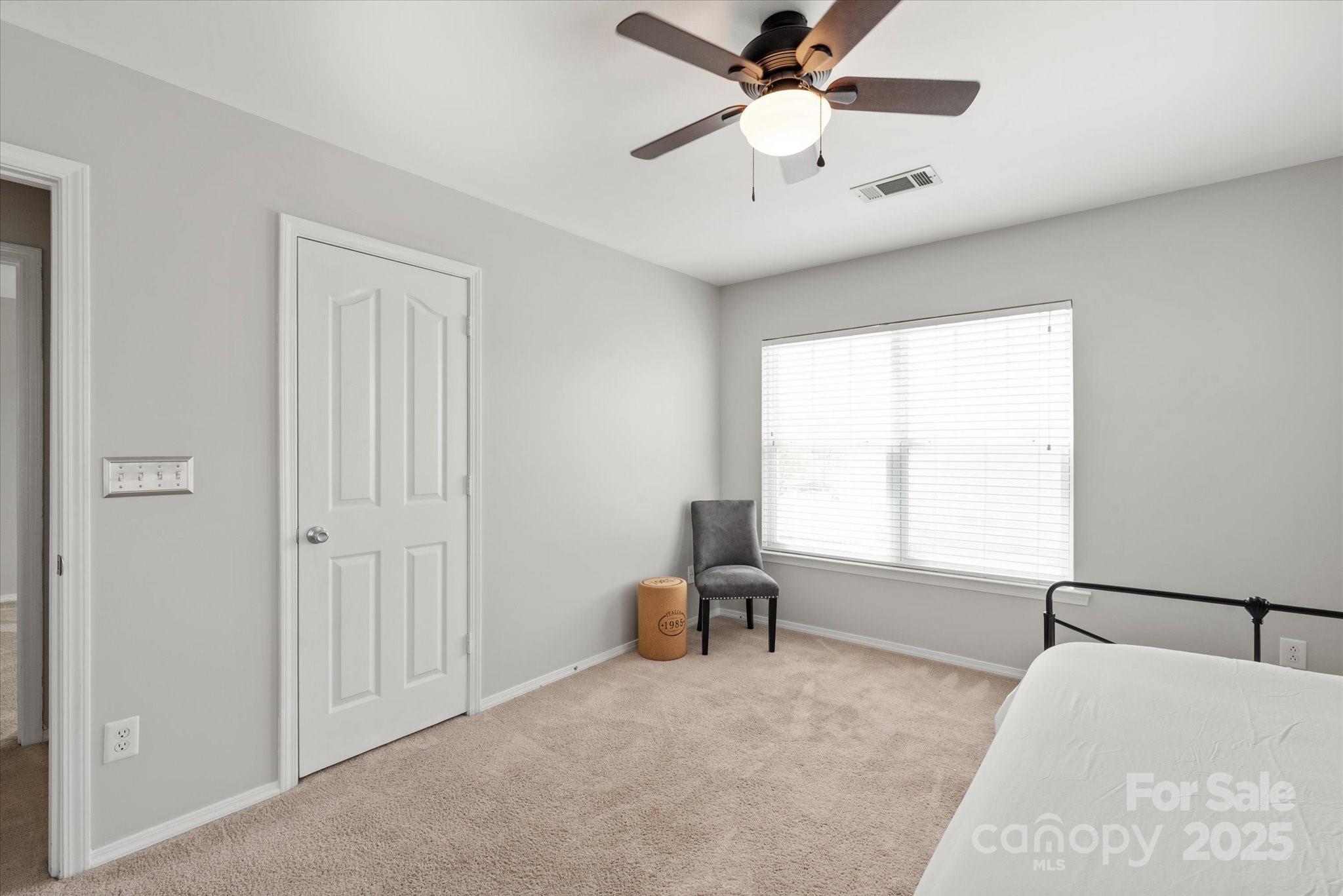 158 Council House Road Fort Mill, SC 29708 - Photo 24 of 41 an empty room with windows and fan