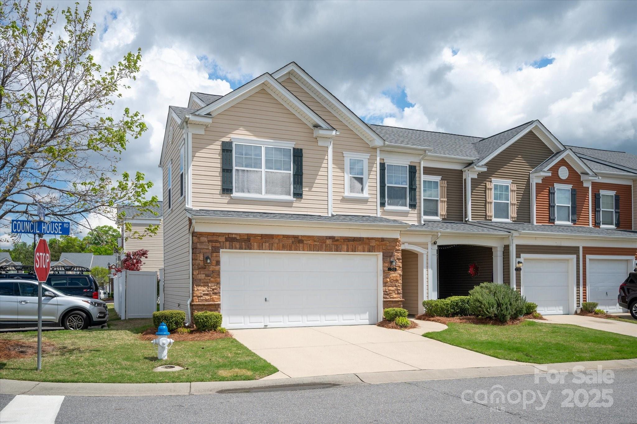 158 Council House Road Fort Mill, SC 29708 - Photo 28 of 41 a front view of a house with a yard and garage