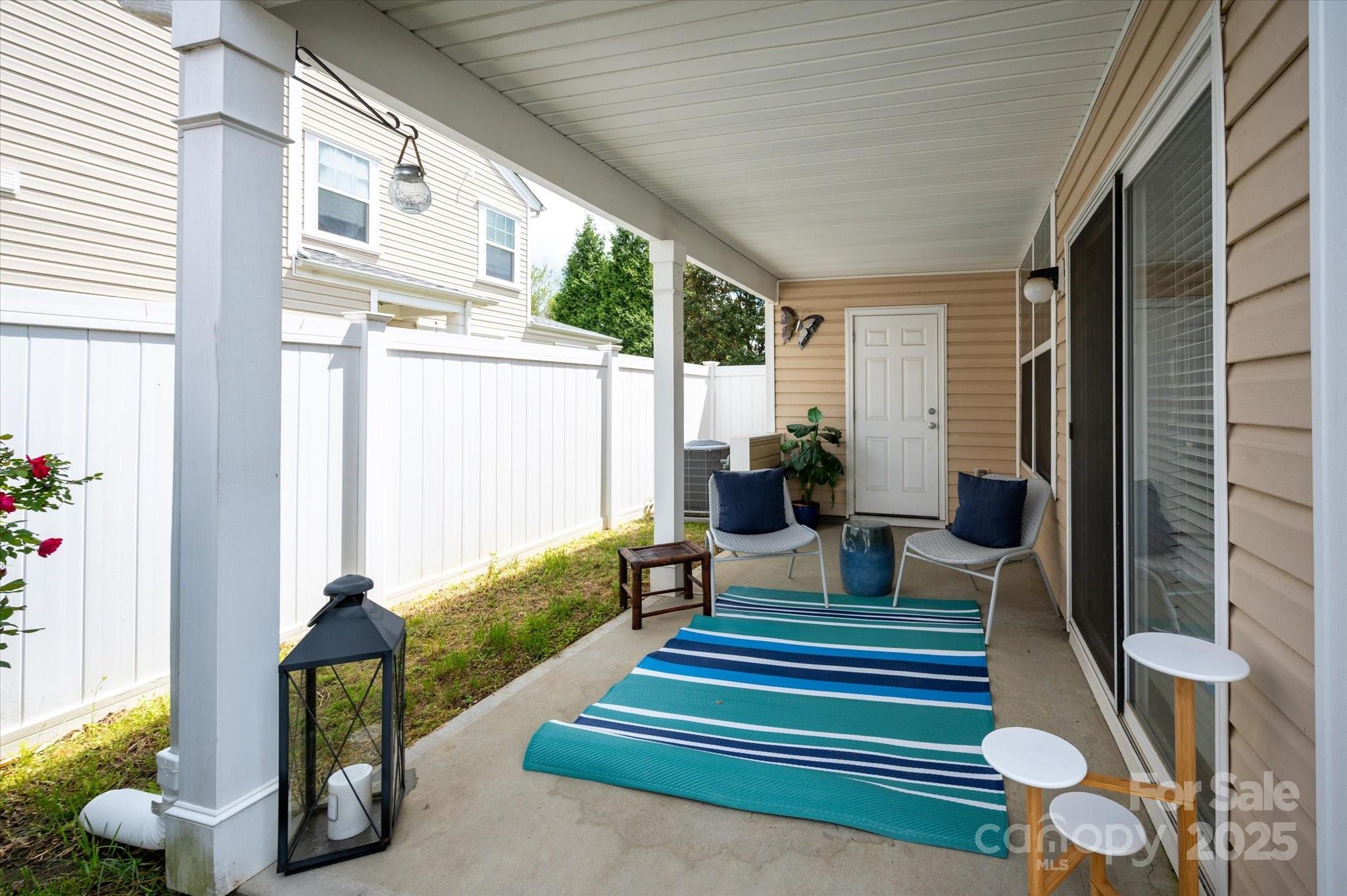 158 Council House Road Fort Mill, SC 29708 - Photo 29 of 41 a living room with furniture and a floor to ceiling window