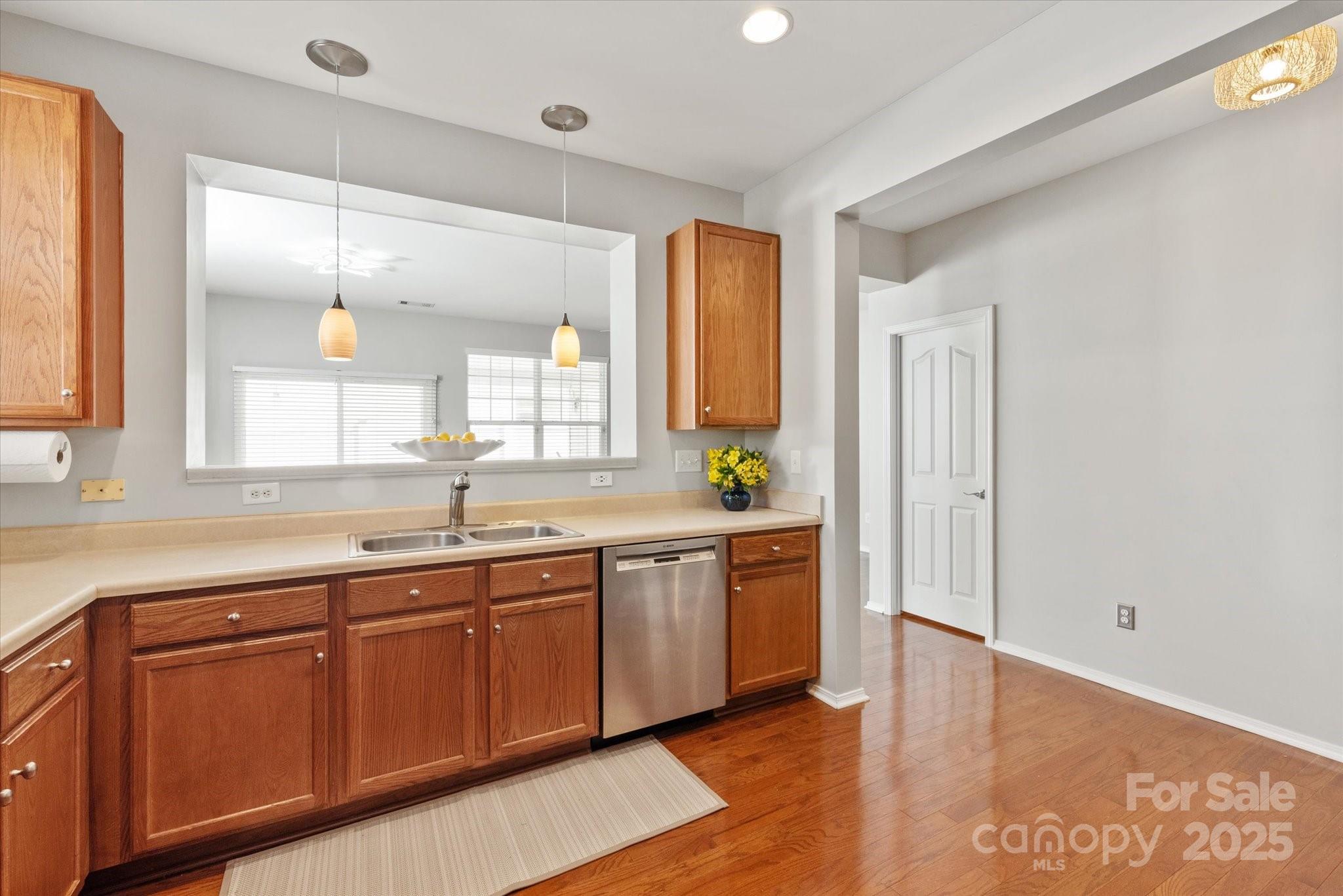 158 Council House Road Fort Mill, SC 29708 - Photo 9 of 41 a large kitchen with stainless steel appliances granite countertop a sink and a granite counter tops