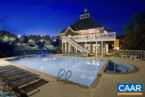 a front view of a house with swimming pool