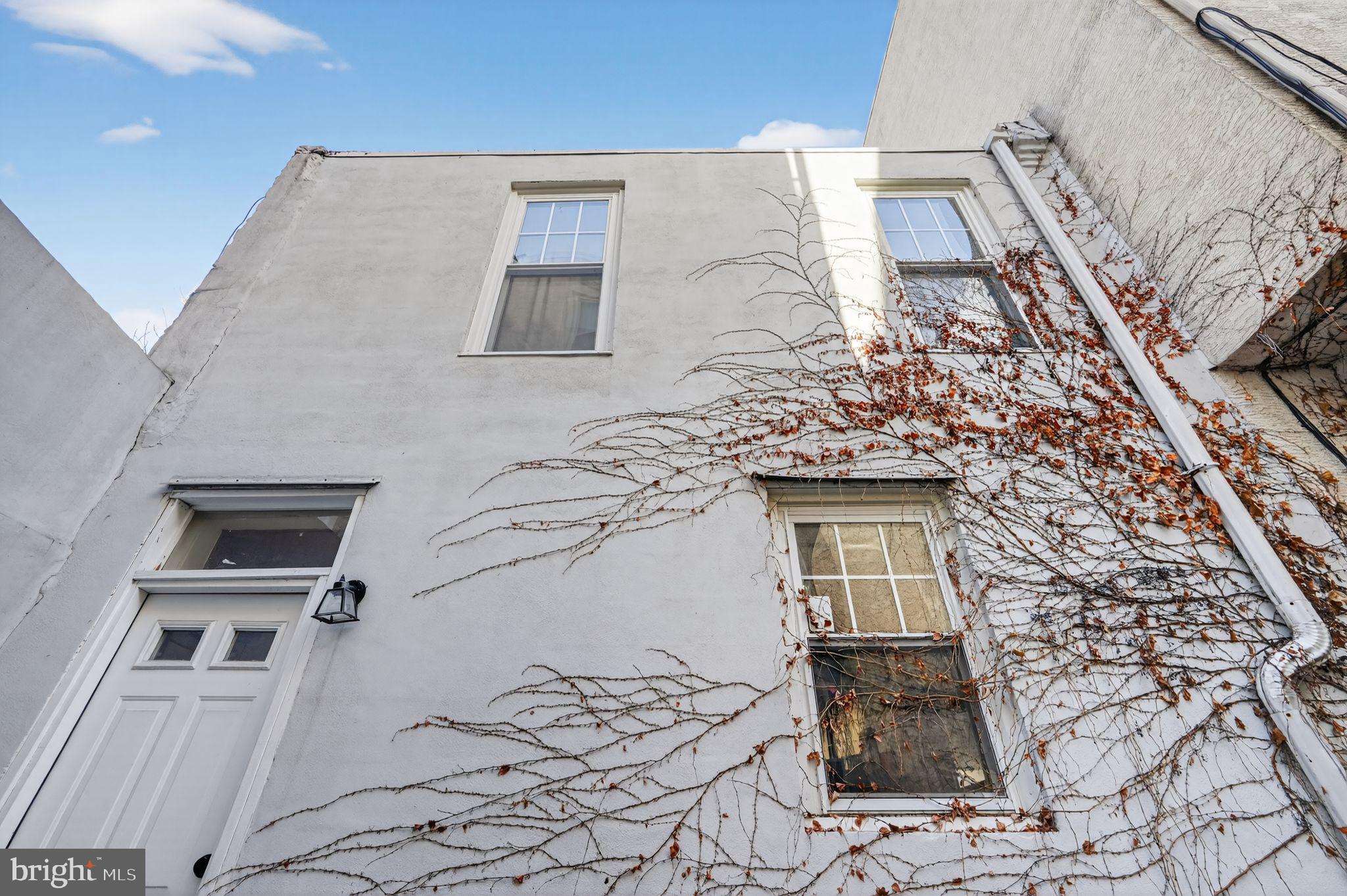 1616 Webster Street Philadelphia, PA 19146 - Photo 18 of 34 Back exterior now - vines can be removed.