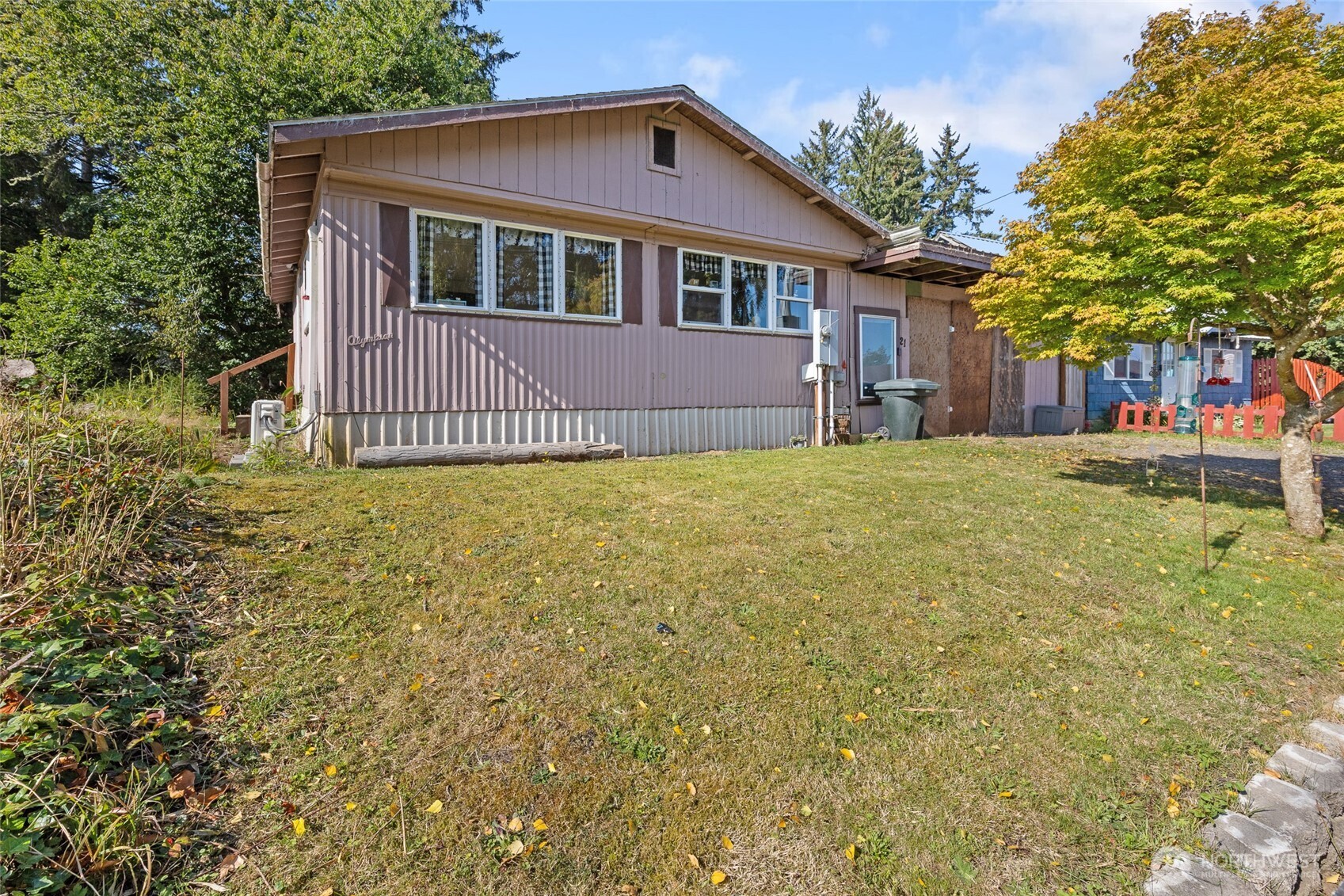 a house view with a garden space