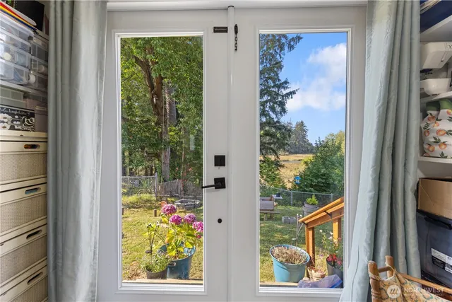 a view of balcony with outer view of the house