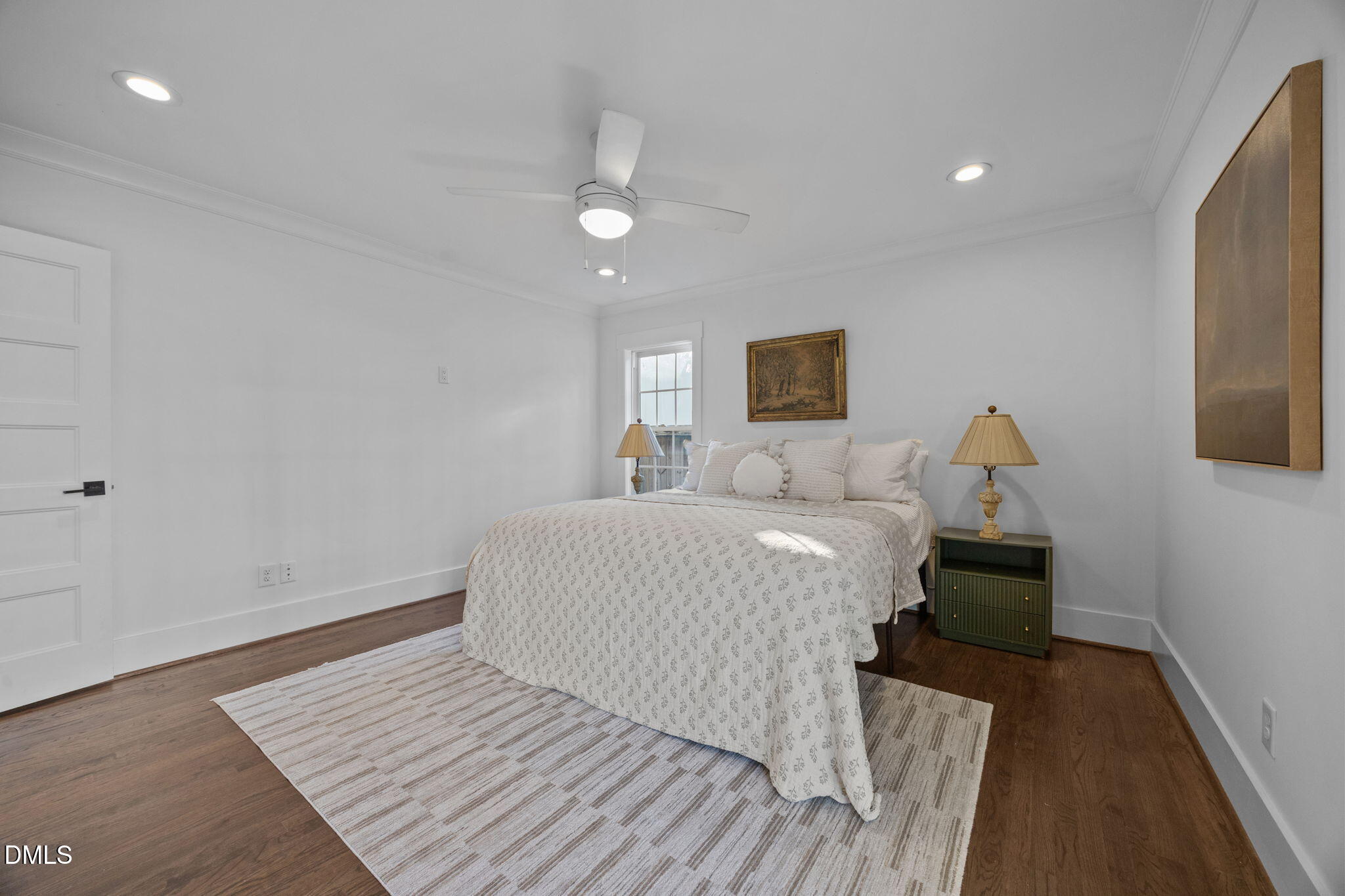 603 Frank Street Raleigh, NC 27604 - Photo 10 of 29 a bedroom with a bed and a dresser