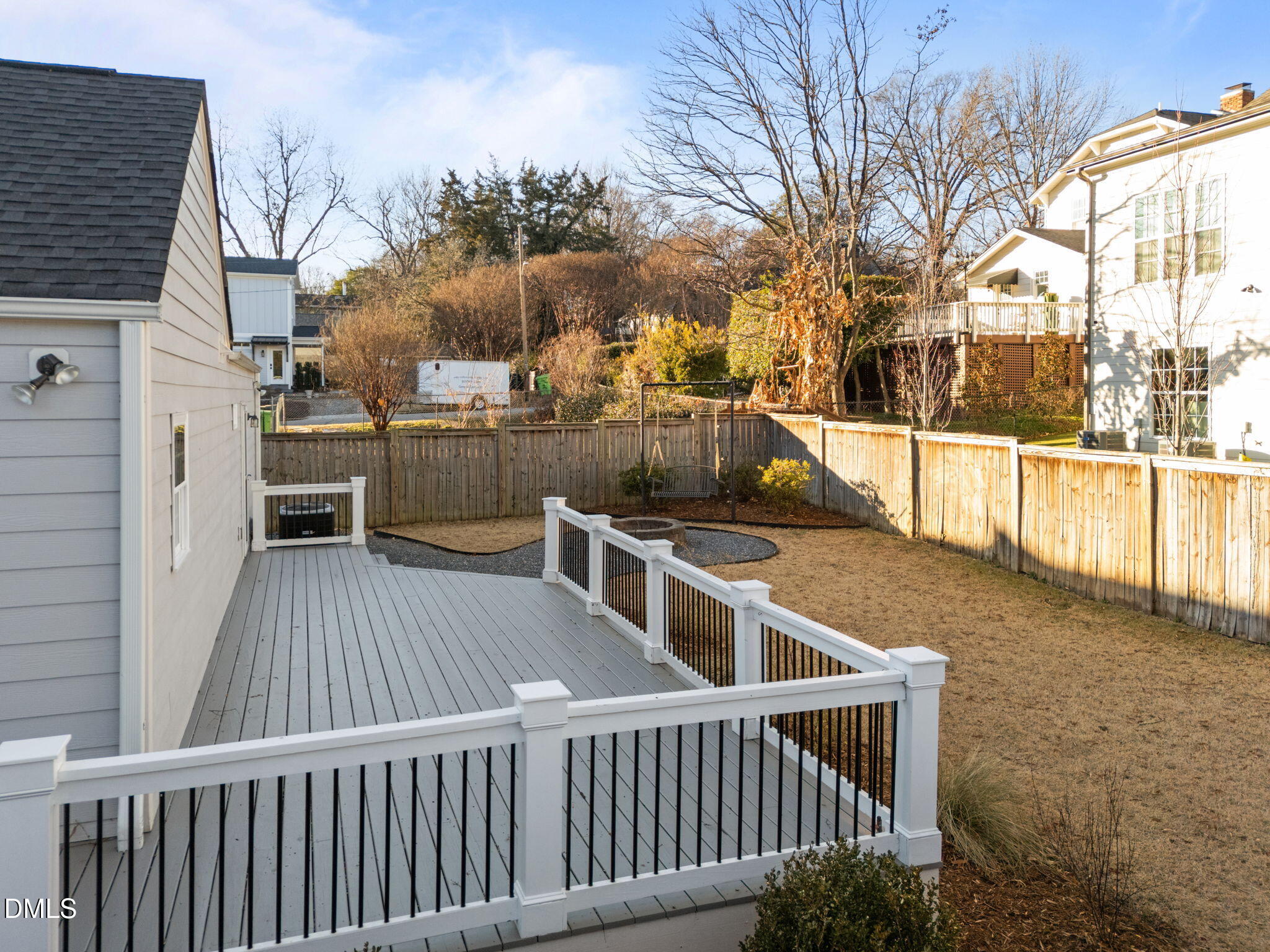 603 Frank Street Raleigh, NC 27604 - Photo 22 of 29 a view of a balcony with wooden floor and fence
