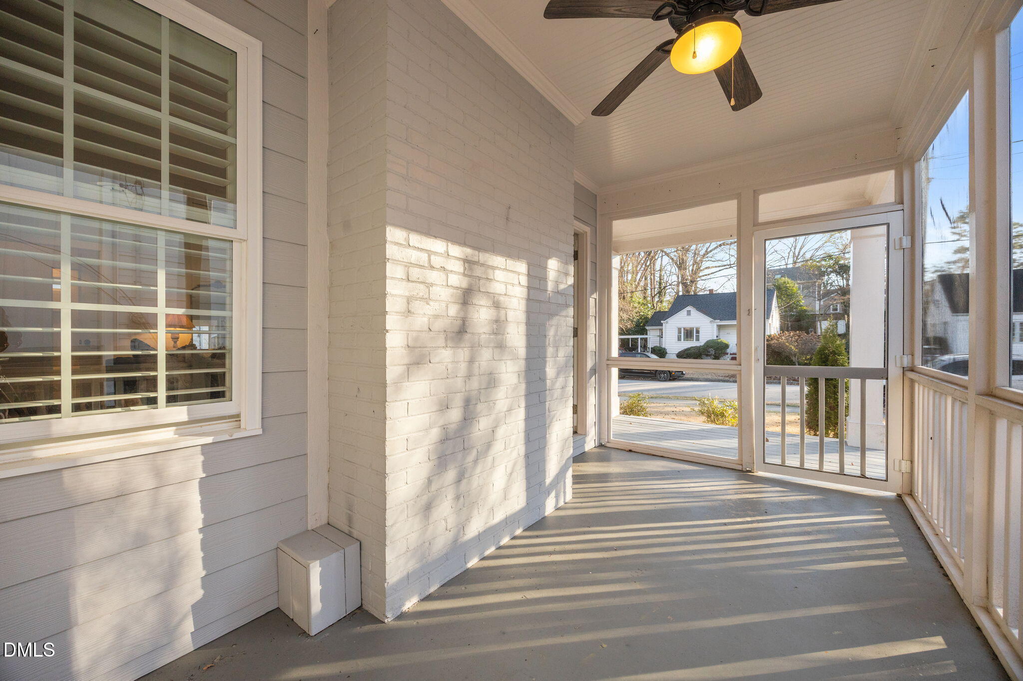 603 Frank Street Raleigh, NC 27604 - Photo 25 of 29 a view of a livingroom with wooden floor and a floor to ceiling window