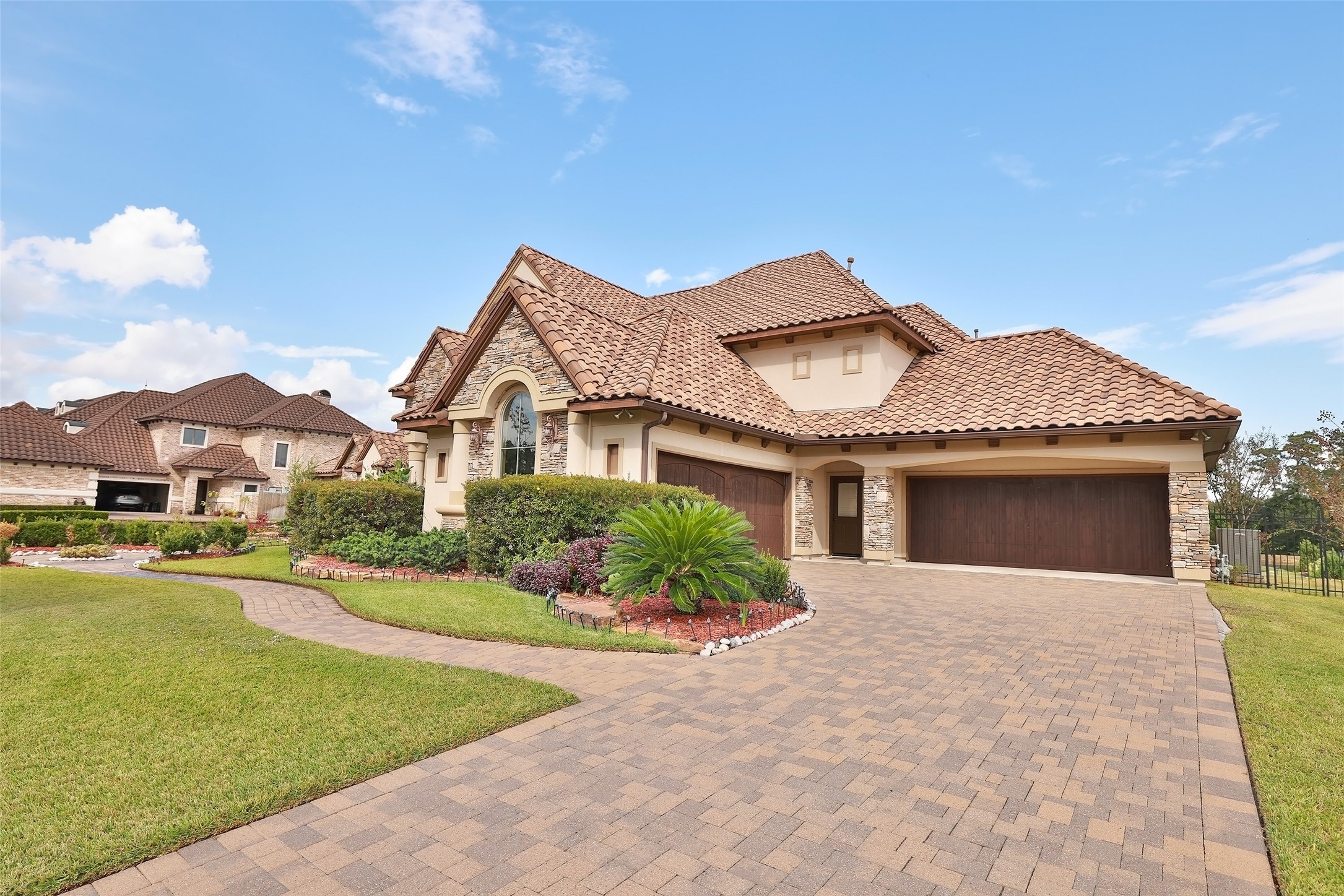 22 Post Shadow Estate Drive Spring, TX 77389 - Photo 6 of 50 a front view of a house with a yard and garage