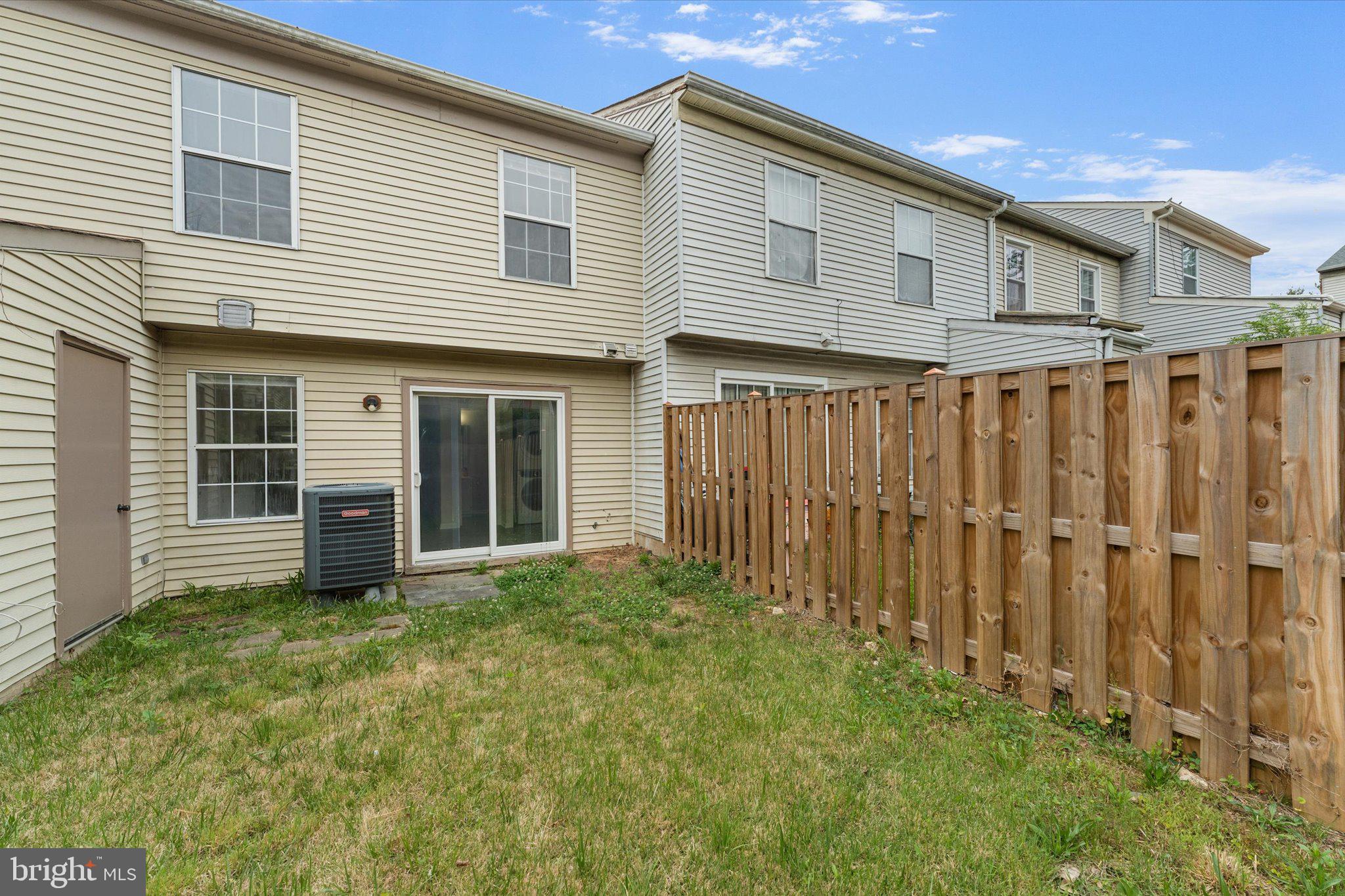 2753 Bixby Road Woodbridge, VA 22193 - Photo 20 of 22 a view of a house with a yard