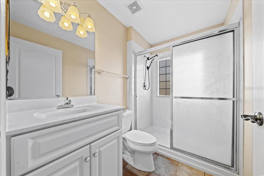 10308 Southwest 83rd Terrace Ocala, FL 34481 - Photo 68 of 75 a bathroom with a sink a toilet and a mirror