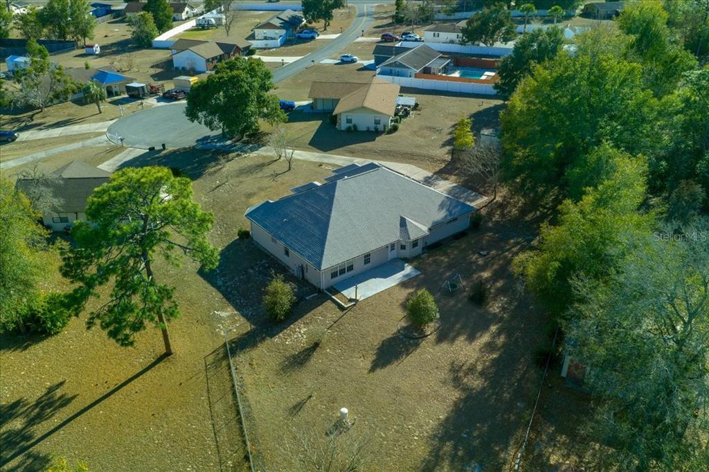 10308 Southwest 83rd Terrace Ocala, FL 34481 - Photo 9 of 75 an aerial view of residential houses with outdoor space