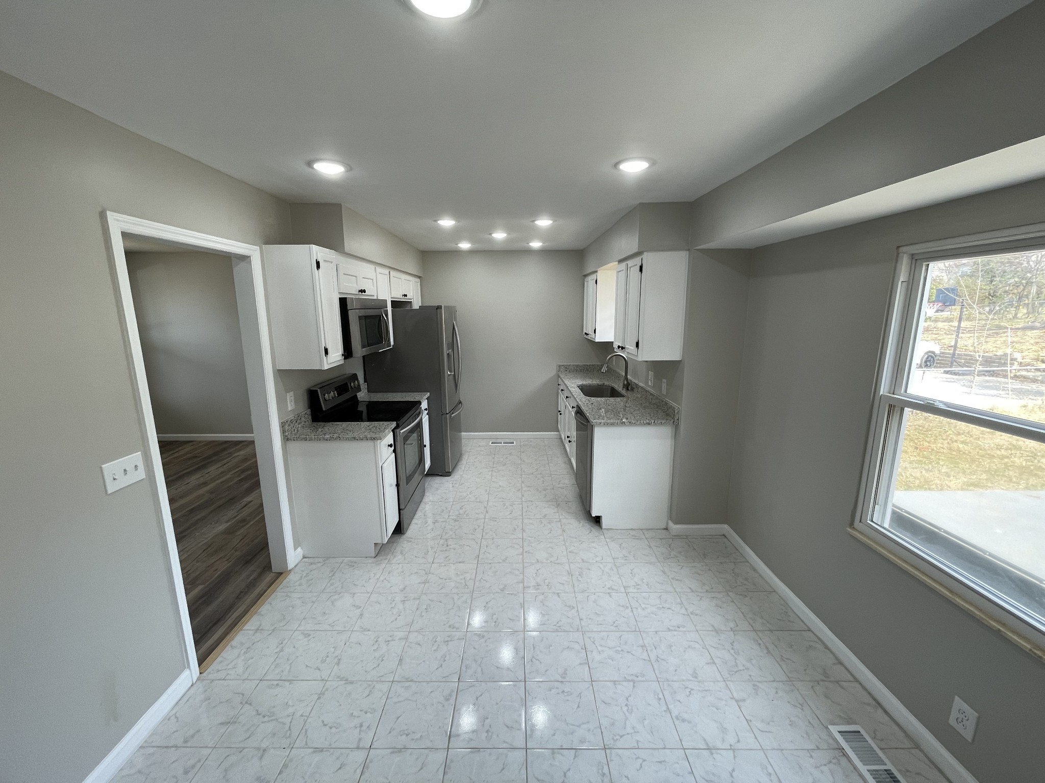 3289 Anderson Road Antioch, TN 37013 - Photo 11 of 40 a kitchen with refrigerator and window