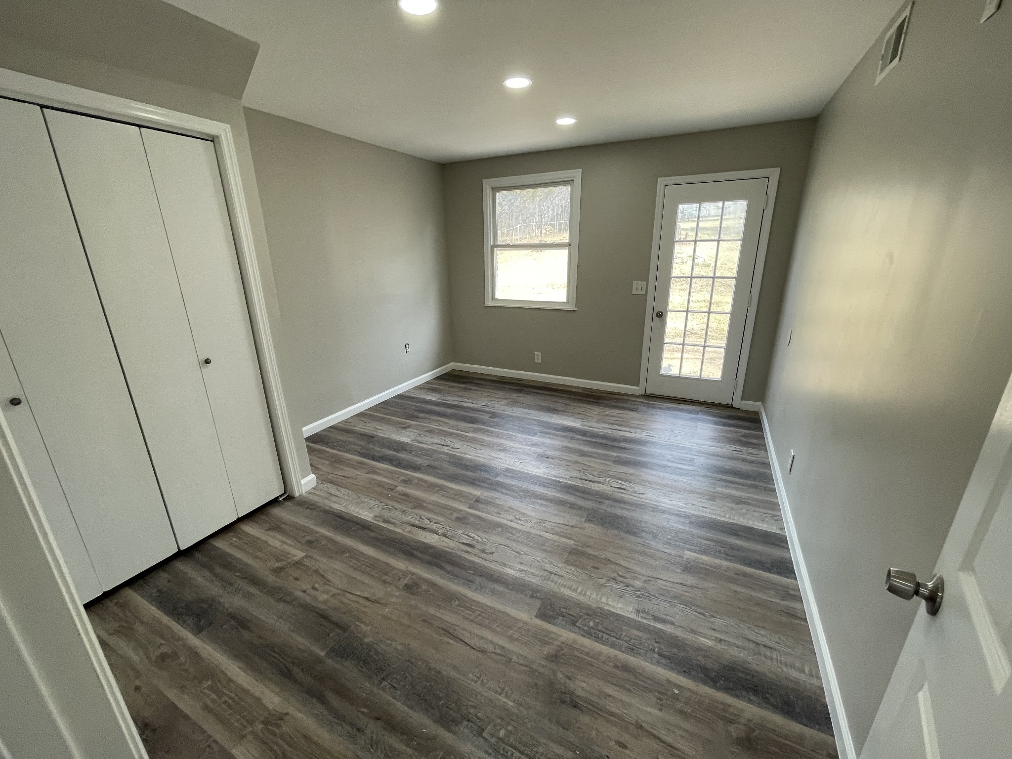 3289 Anderson Road Antioch, TN 37013 - Photo 21 of 40 a view of an empty room with wooden floor and a window