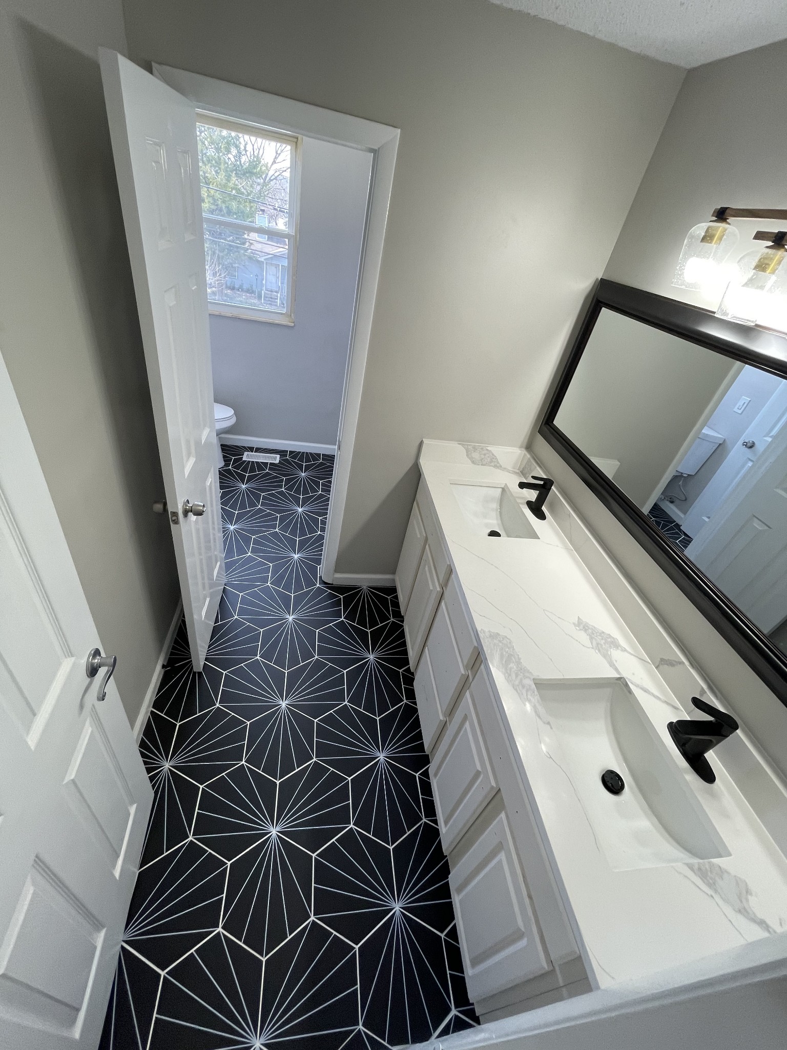 3289 Anderson Road Antioch, TN 37013 - Photo 24 of 40 a bathroom with a sink and a mirror