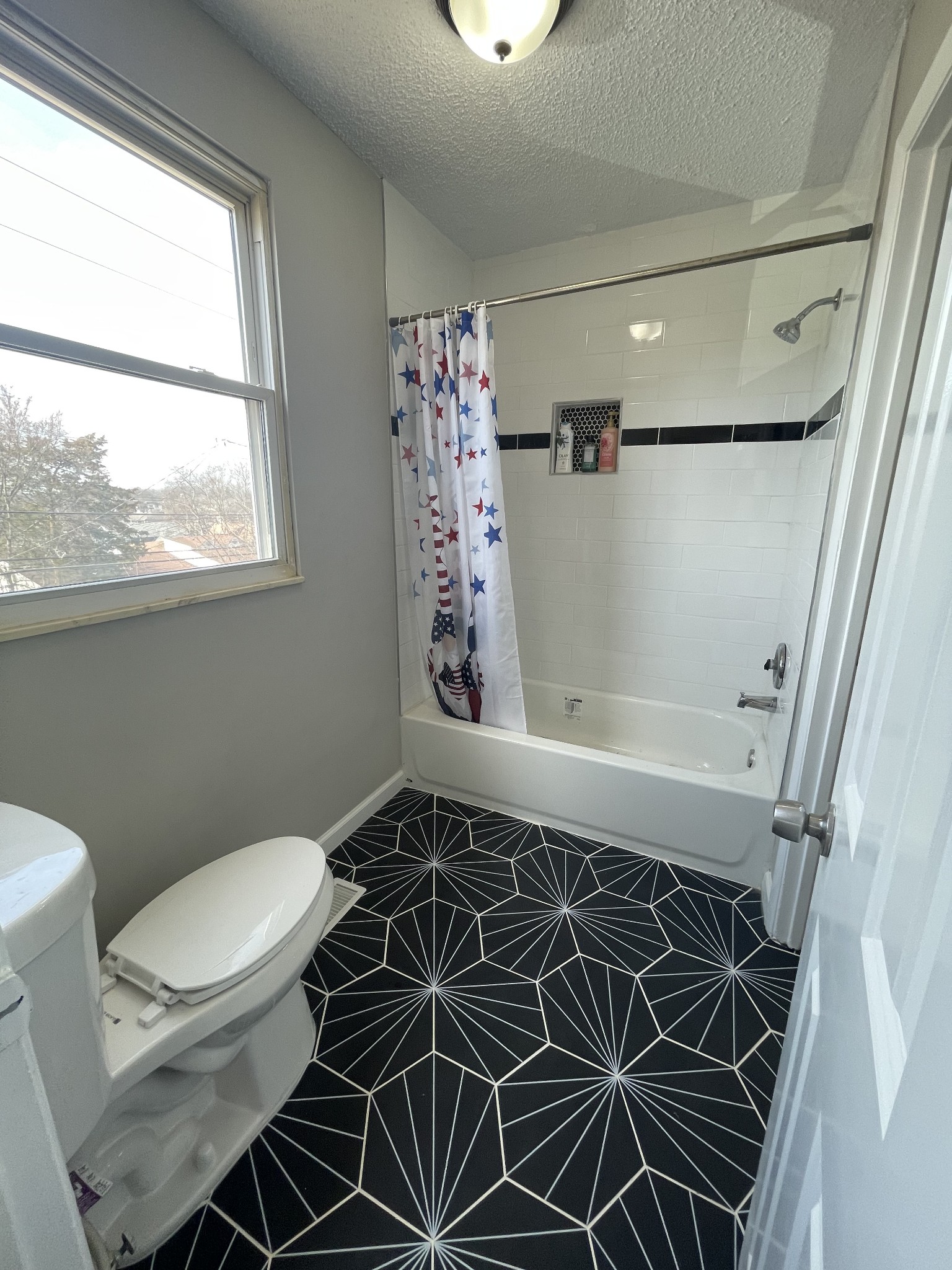 3289 Anderson Road Antioch, TN 37013 - Photo 34 of 40 a bathroom with a toilet sink and shower