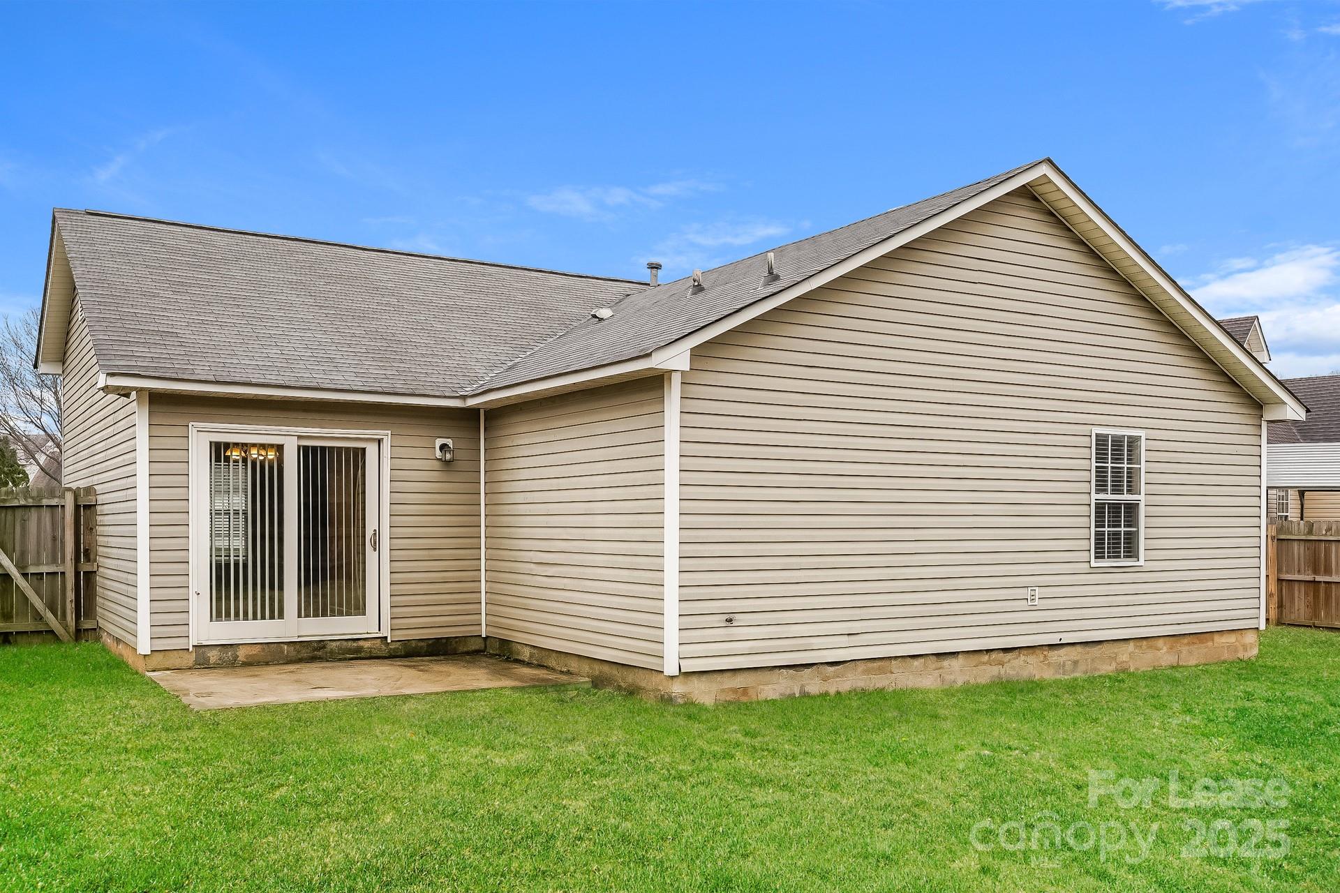 4110 Runaway Circle Monroe, NC 28110 - Photo 16 of 16 a view of a house with a backyard