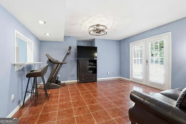 a living room with furniture and a table