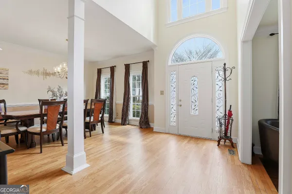 a view of a livingroom with furniture and wooden floor