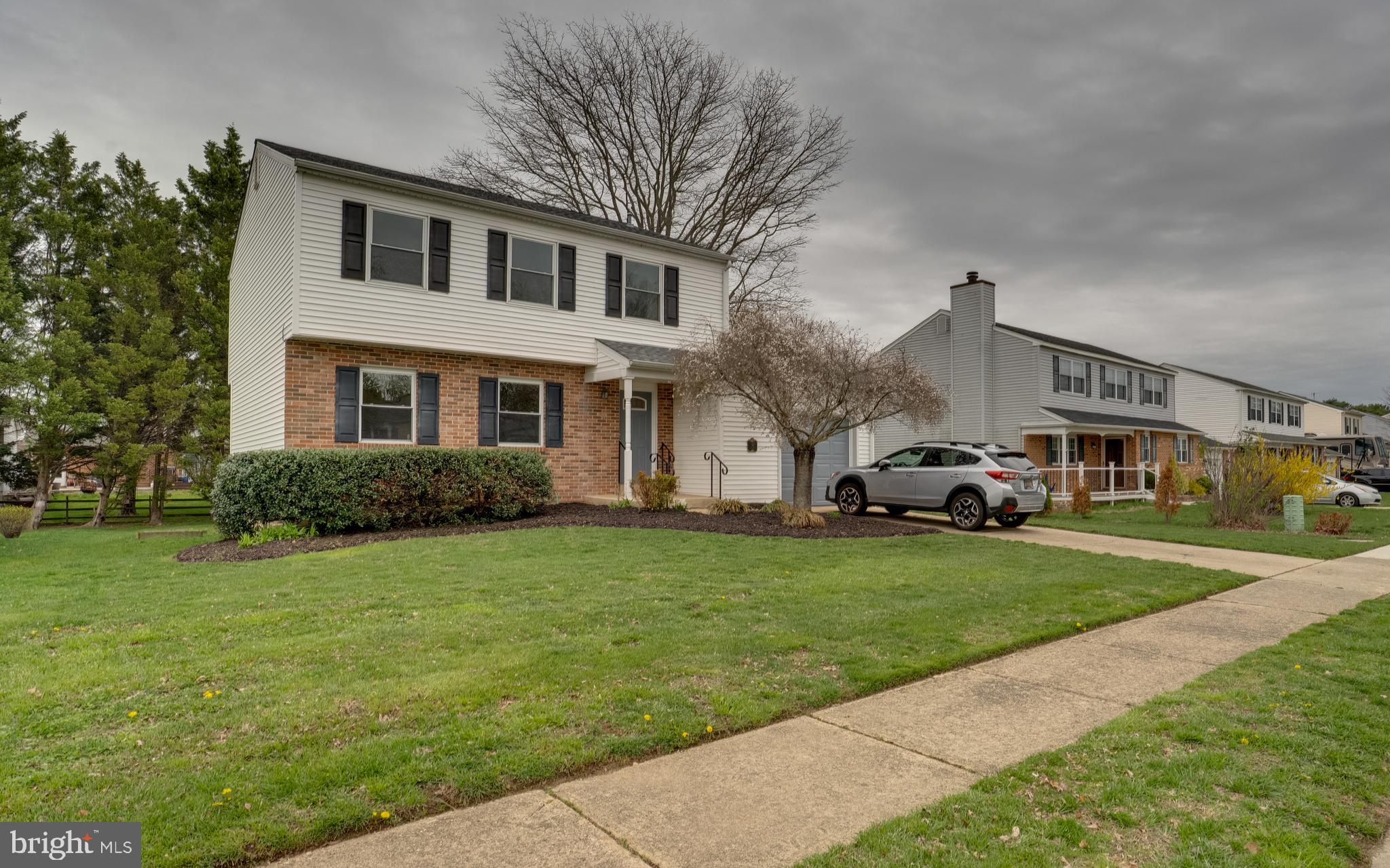 32 Southbridge Road Bear, DE 19701 - Photo 1 of 57 a front view of a house with a garden