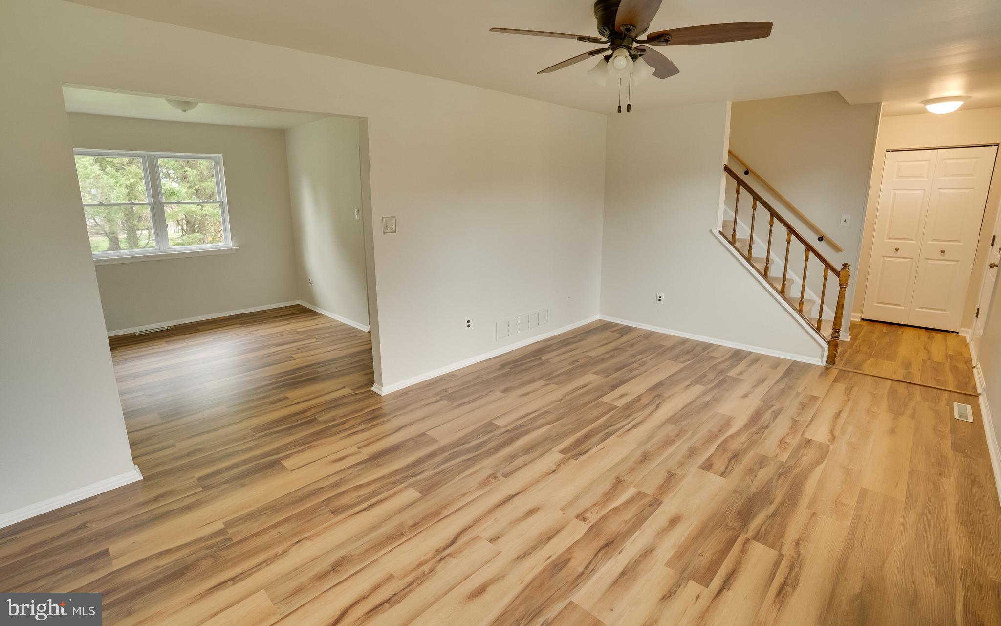 32 Southbridge Road Bear, DE 19701 - Photo 18 of 57 an empty room with wooden floor fan and windows