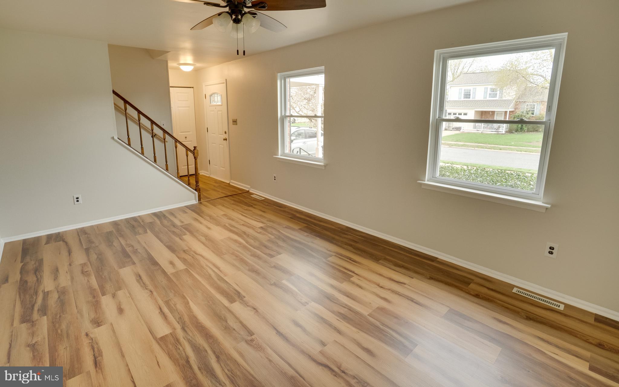 32 Southbridge Road Bear, DE 19701 - Photo 19 of 57 a view of an empty room with a window and wooden floor