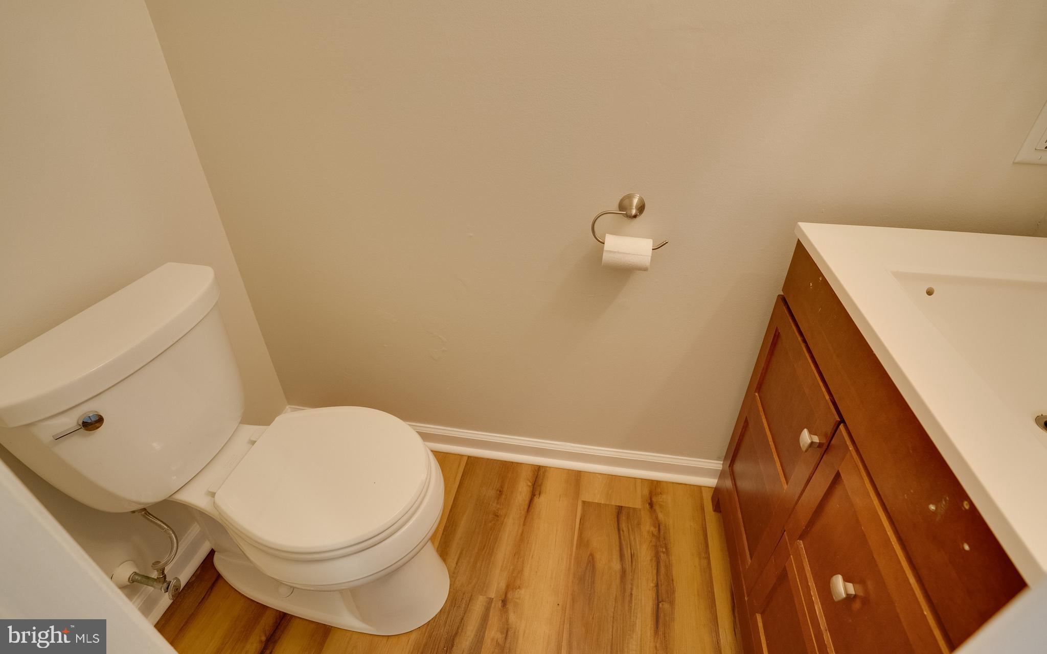 32 Southbridge Road Bear, DE 19701 - Photo 23 of 57 a white toilet sitting next to a white tub