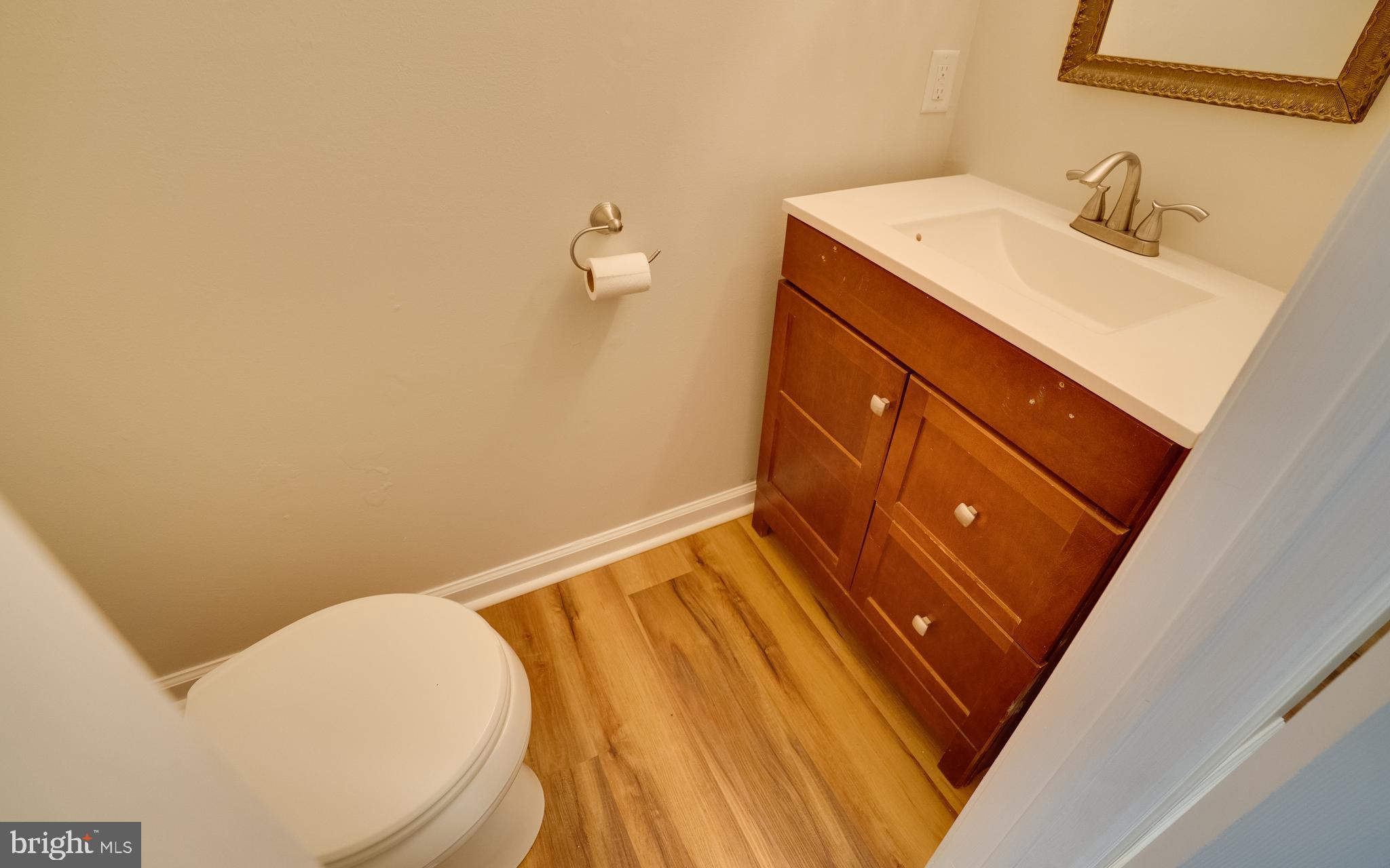 32 Southbridge Road Bear, DE 19701 - Photo 24 of 57 a bathroom with a sink and mirror