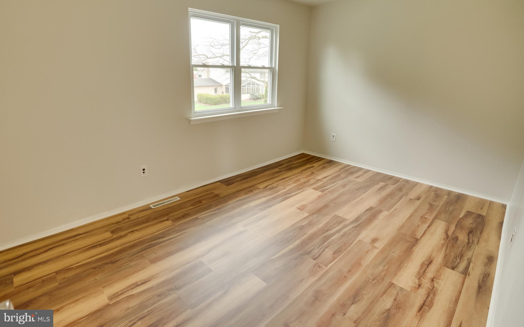 32 Southbridge Road Bear, DE 19701 - Photo 31 of 57 an empty room with wooden floor