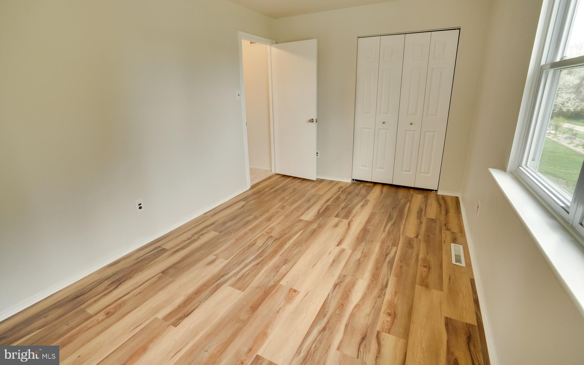 32 Southbridge Road Bear, DE 19701 - Photo 32 of 57 a view of wooden floor in a room