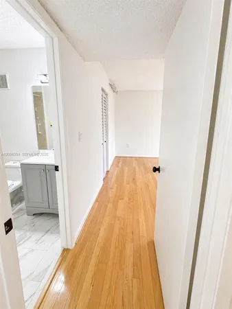 a view of a bathroom with a sink